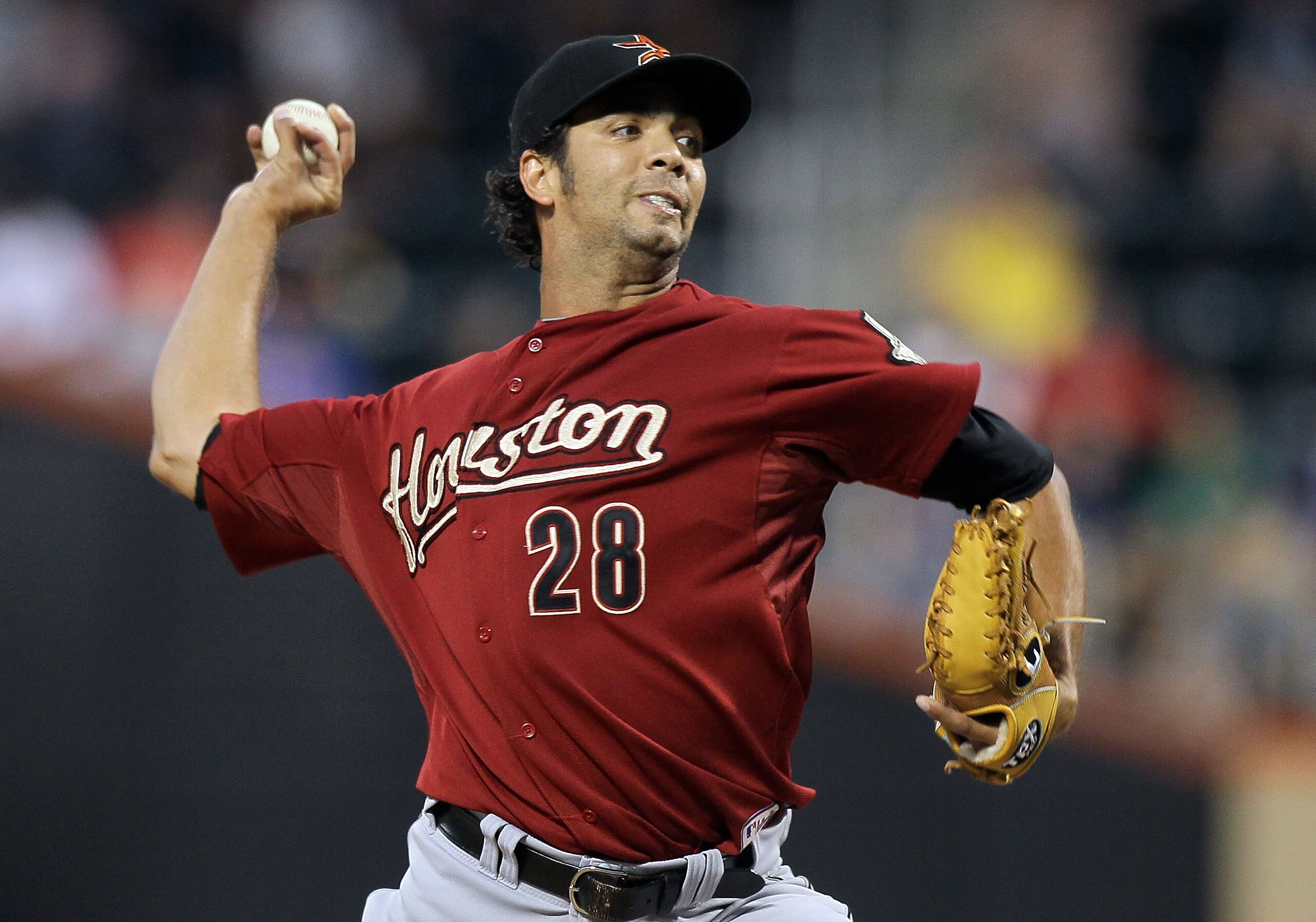 NEW YORK - AUGUST 27:  Nelson Figueroa #28 of the Houston Astros delivers a pitch against the New York Mets on August 27, 2010 at Citi Field in the Flushing neighborhood of the Queens borough of New York City.  (Photo by Jim McIsaac/Getty Images)