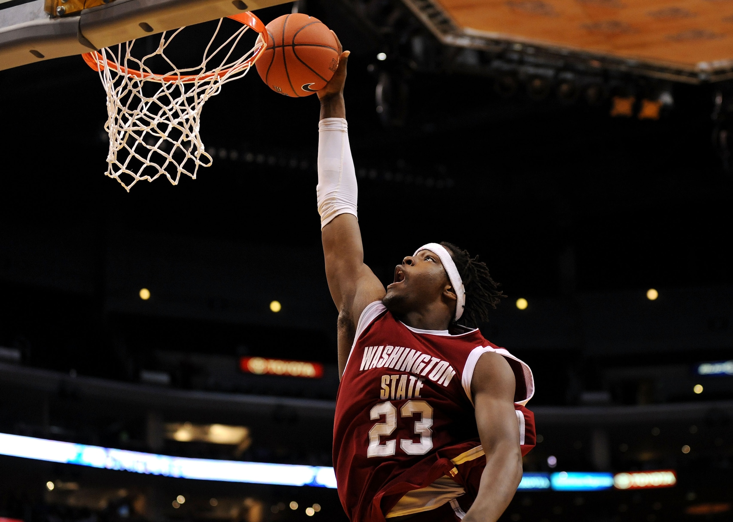LOS ANGELES, CA - MARCH 12:  Forward DeAngelo Casto #23 of the Washington State Cougars goes up for a dunk against the UCLA Bruins in the Pacific Life Pac-10 Men's Basketball Tournament at the Staples Center on March 12, 2009 in Los Angeles, California.
