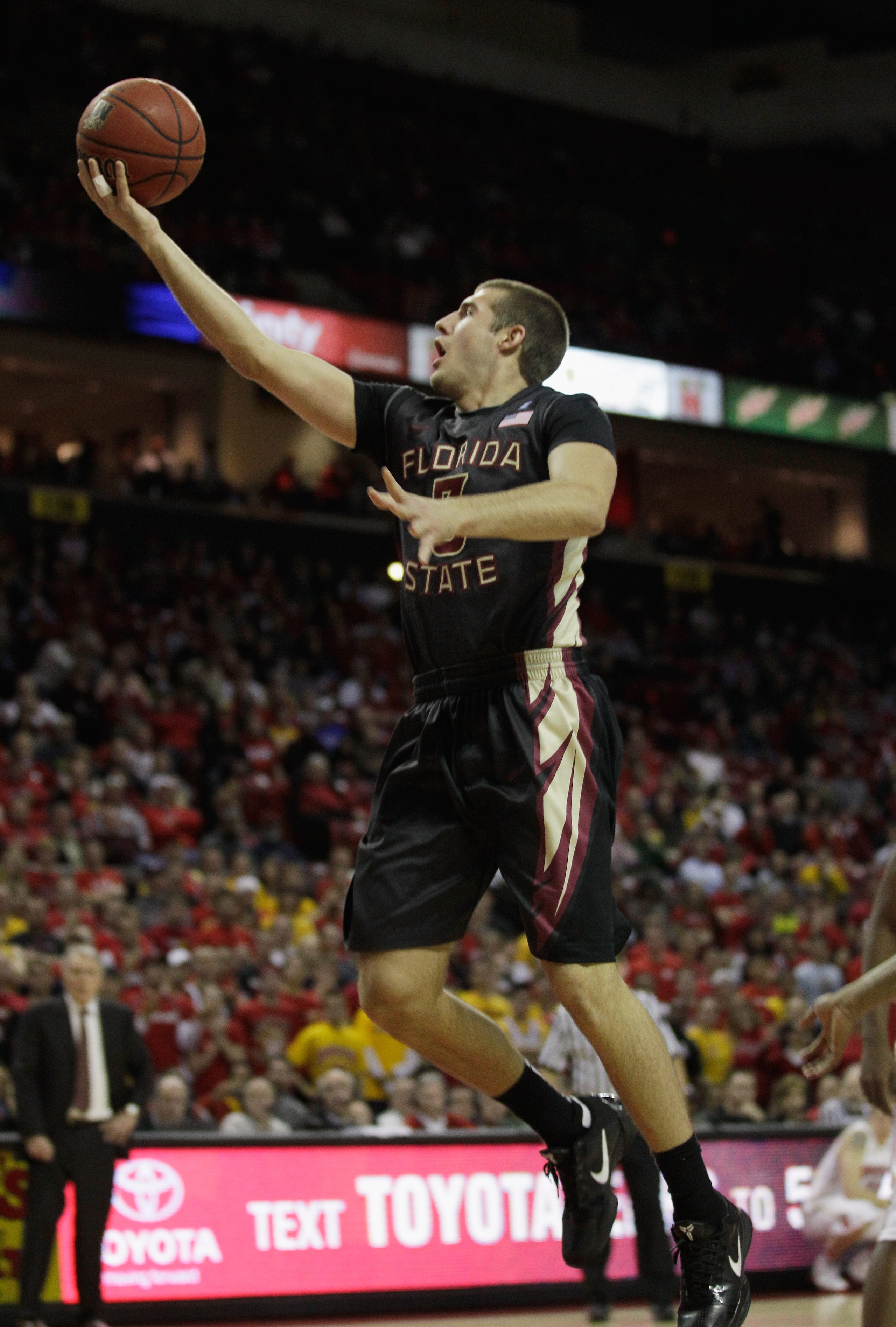 COLLEGE PARK, MD - FEBRUARY 23: Luke Loucks #3 of the  Florida State Seminoles drives to the basket against the  Maryland Terrapins at the Comast Center on February 23, 2011 in College Park, Maryland.  (Photo by Rob Carr/Getty Images)
