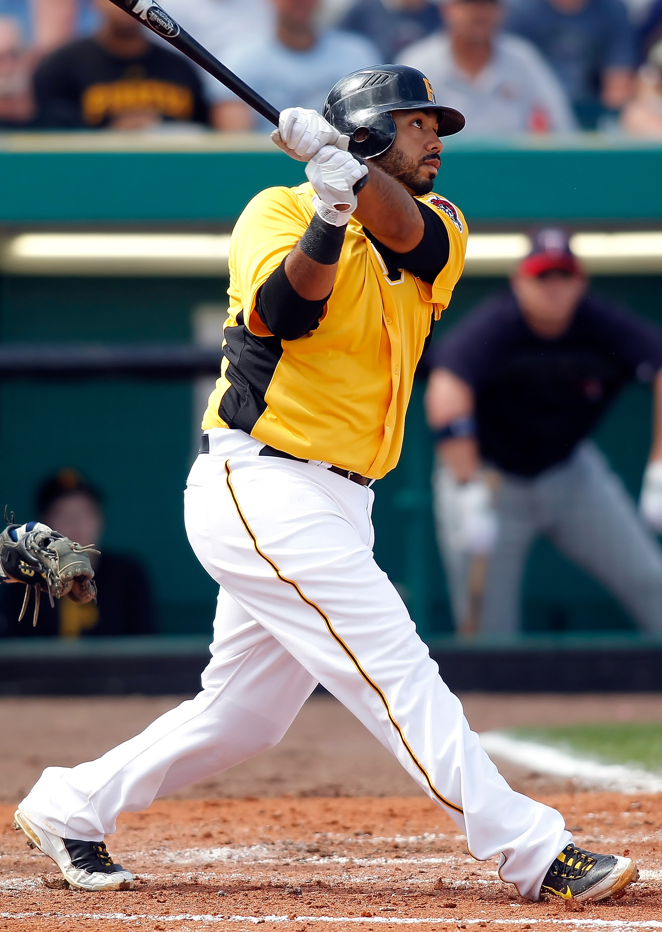 Pittsburgh Pirates Pedro Alvarez tosses his bat and walks to first