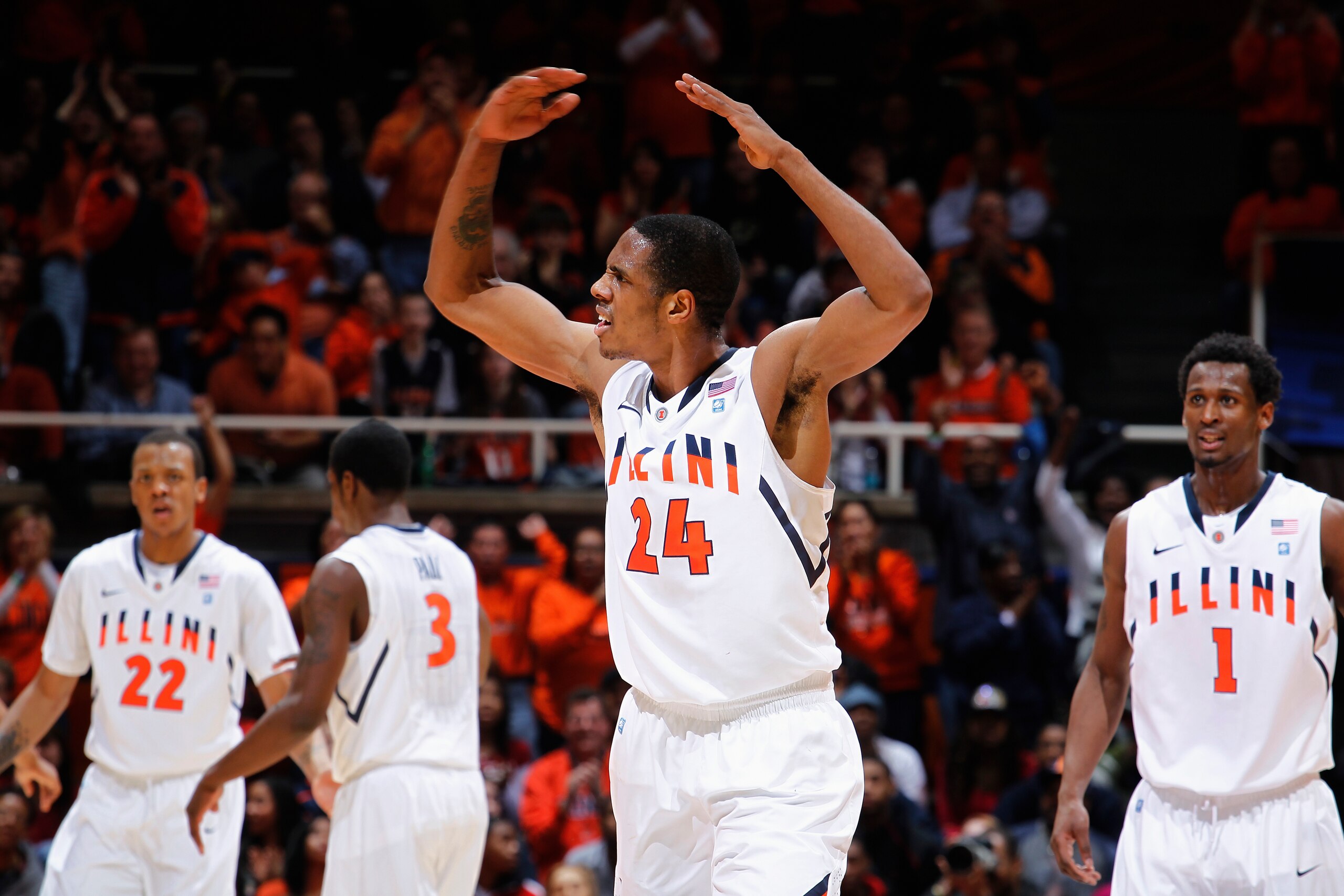 CHAMPAIGN, IL - FEBRUARY 13: Mike Davis #24 of the Illinois Fighting Illini tries to fire up the crowd against the Purdue Boilermakers at Assembly Hall on February 13, 2011 in Champaign, Illinois. Purdue defeated Illinois 81-70. (Photo by Joe Robbins/Gett