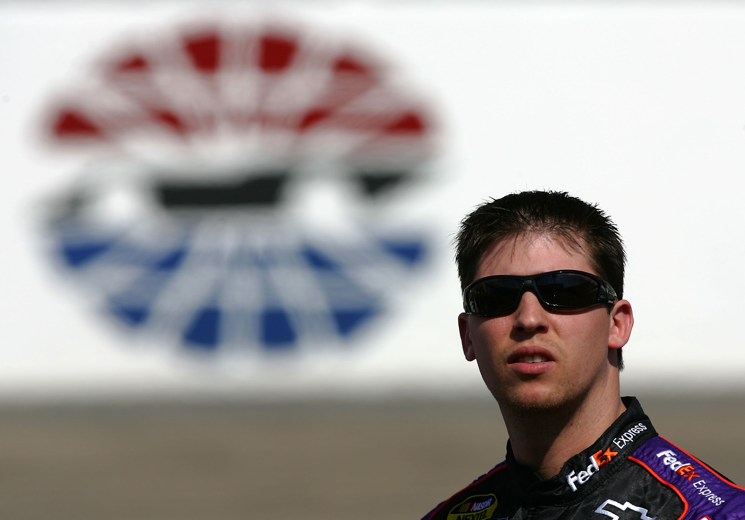 BRISTOL, TN - MARCH 23: Denny Hamlin, driver of the #11 FedEx Express Chevrolet, looks on during qualifying for the NASCAR Nextel Cup Series Food City 500 at Bristol Motor Speedway on March 23, 2007 in Bristol, Tennessee. (Photo by Harry How/Getty Image BRISTOL, TN - MARCH 23: Denny Hamlin, driver of the #11 FedEx Express Chevrolet, looks on during qualifying for the NASCAR Nextel Cup Series Food City 500 at Bristol Motor Speedway on March 23, 2007 in Bristol, Tennessee. (Photo by Harry How/Getty Image