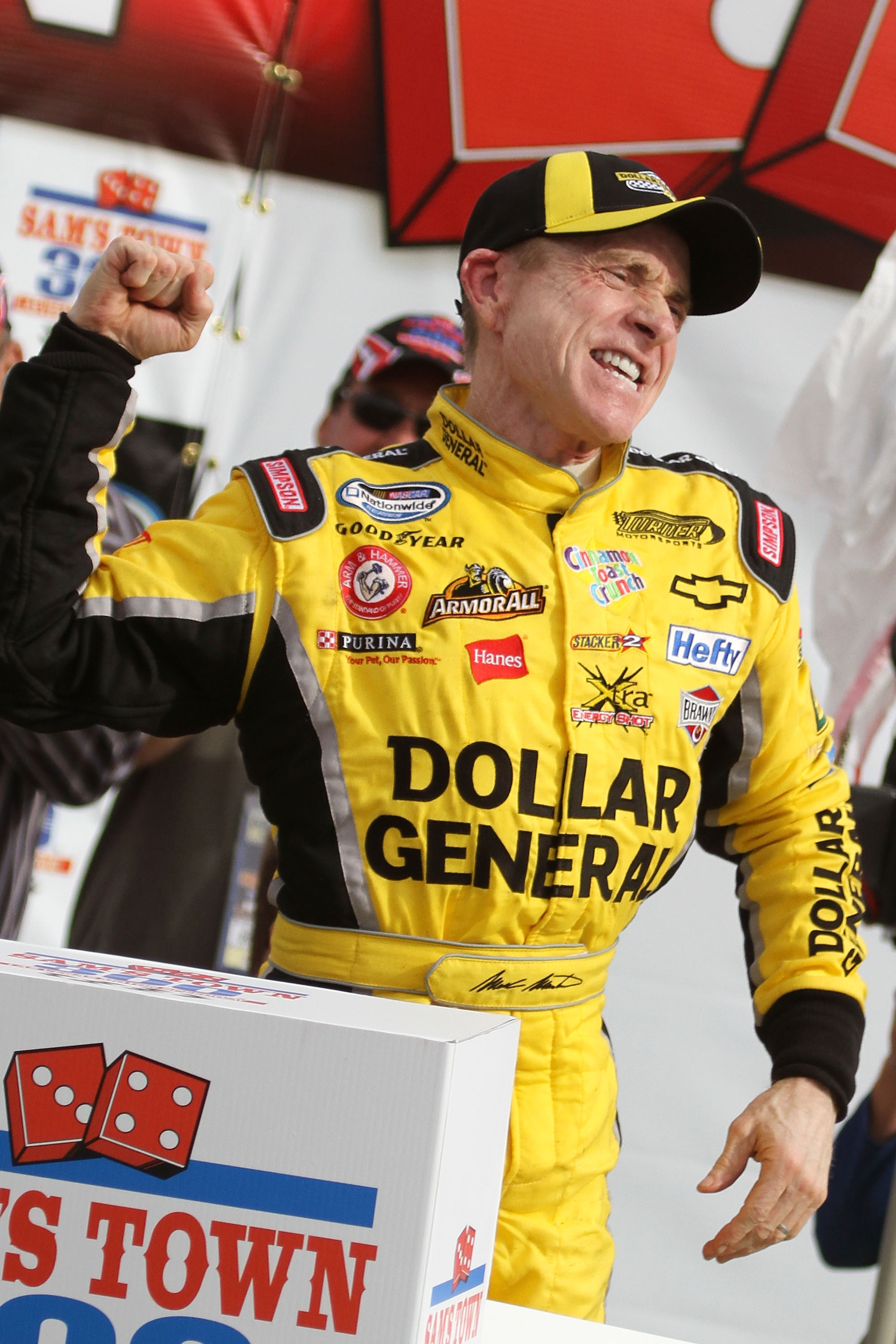 LAS VEGAS, NV - MARCH 05:  Mark Martin, driver of the #32 Dollar General Chevrolet, celebrates in Victory Lane after winning the NASCAR Nationwide Series Sam's Town 300 at Las Vegas Motor Speedway on March 5, 2011 in Las Vegas, Nevada.  (Photo by Jerry Ma