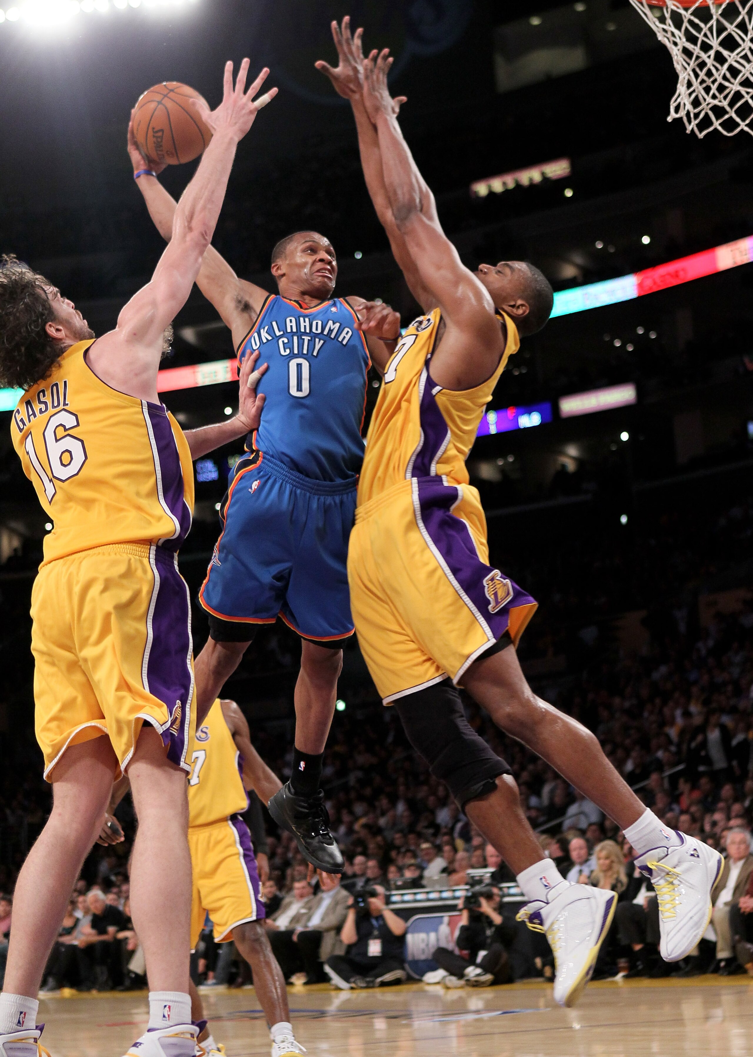 LOS ANGELES - APRIL 20:  Russell Westbrook #0 of the Oklahoma City Thunde goes up for a shot over Gasol #16 of the Los Angeles Lakers during  Game Two of the Western Conference Quarterfinals of the 2010 NBA Playoffs on April 20, 2010 at Staples Center in