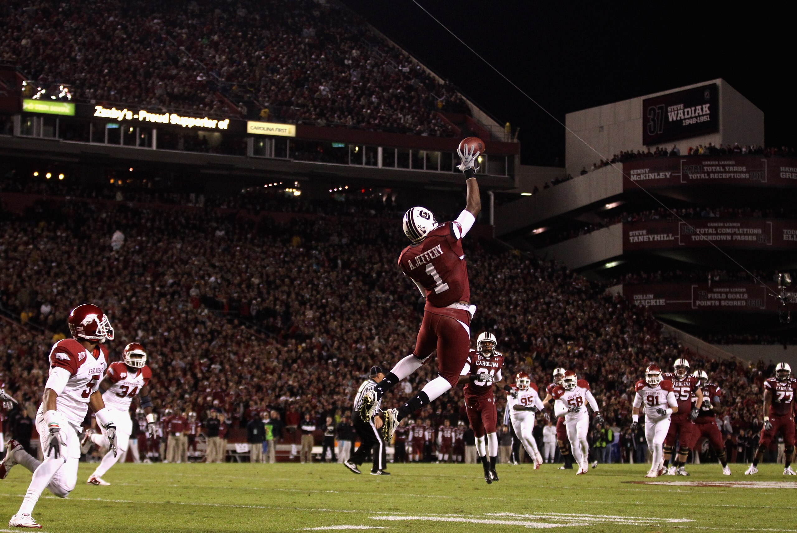COLUMBIA, SC - NOVEMBER 06:  The defense of the Arkansas Razorbacks watch as Alshon Jeffery #1 of the South Carolina Gamecocks makes a catch during their game at Williams-Brice Stadium on November 6, 2010 in Columbia, South Carolina.  (Photo by Streeter L