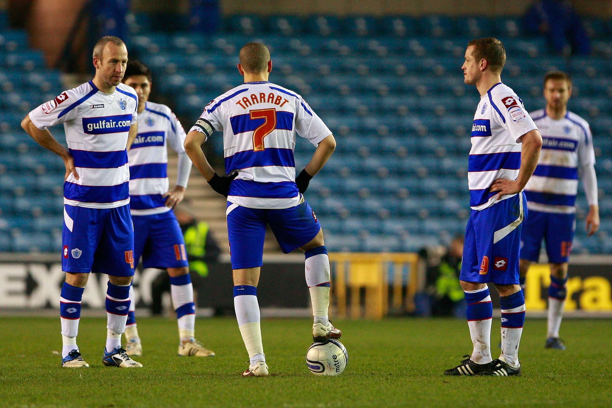 LONDON, ENGLAND - MARCH 08:  QPR players show their dejection after conceding a goal during the npower Championship match between Millwall and Queens Park Rangers at The Den on March 8, 2011 in London, England.  (Photo by Dan Istitene/Getty Images)