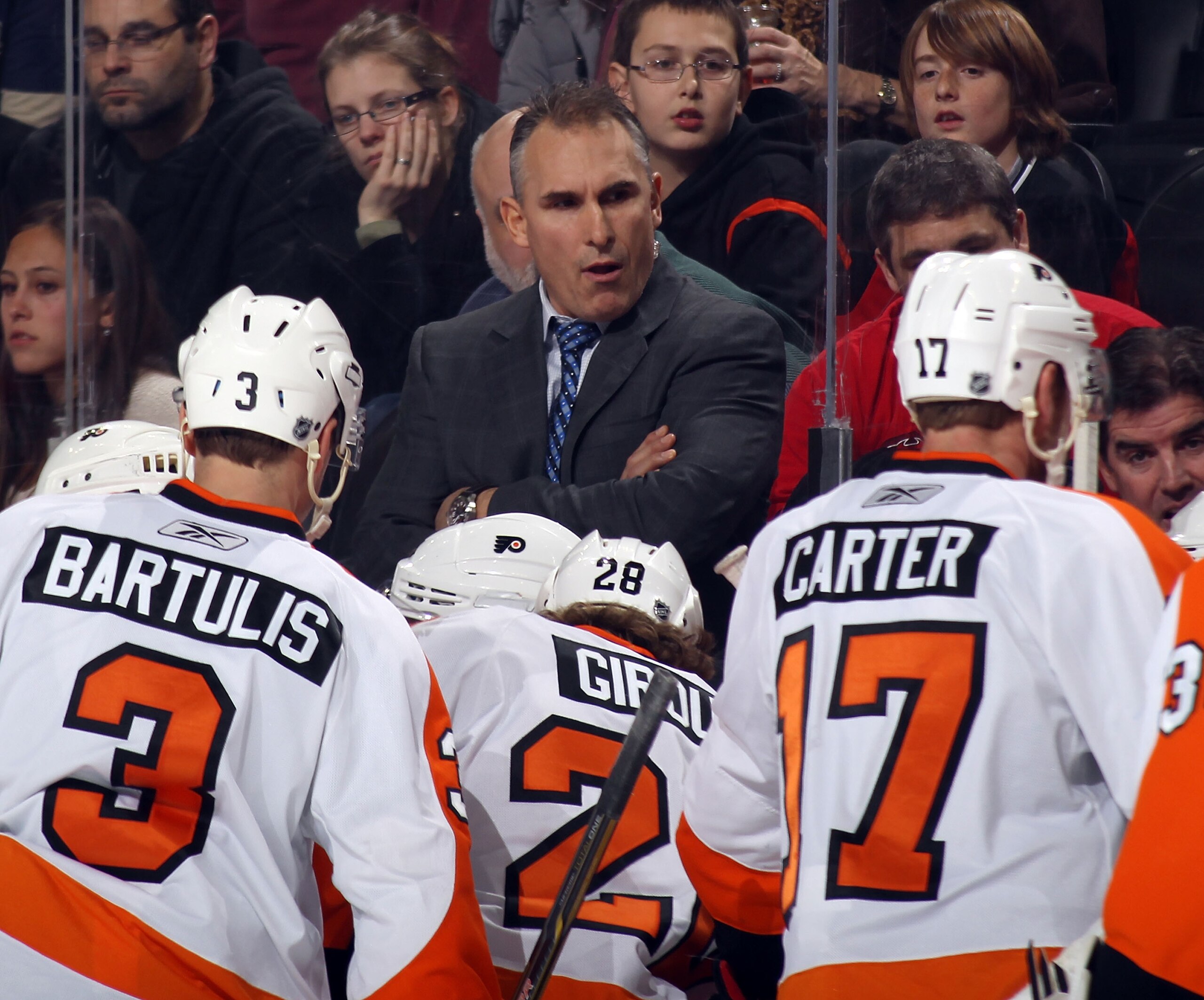 NEWARK, NJ - JANUARY 06:  Assistant coach Craig Berube of the Philadelphia Flyers gives his players instructions during the game against the New Jersey Devils at the Prudential Center on January 6, 2011 in Newark, New Jersey.  (Photo by Bruce Bennett/Gett