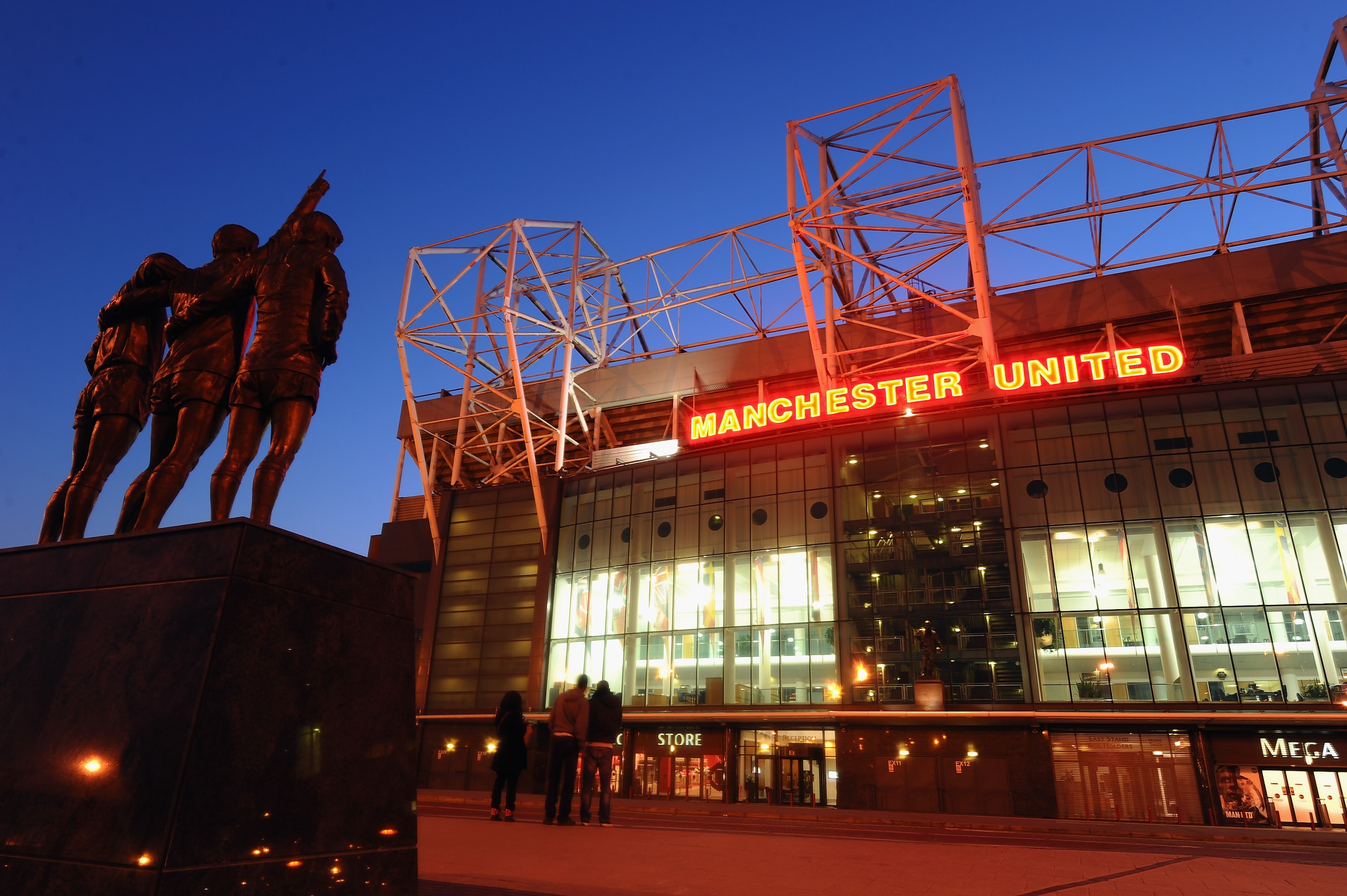 MANCHESTER, UNITED KINGDOM - MARCH 02:  A statue of George Best, Denis Law and Bobby Charlton standing opposite Old Trafford, home of Manchester United on March 2, 2011 in Manchester, England.  (Photo by Mike Hewitt/Getty Images)