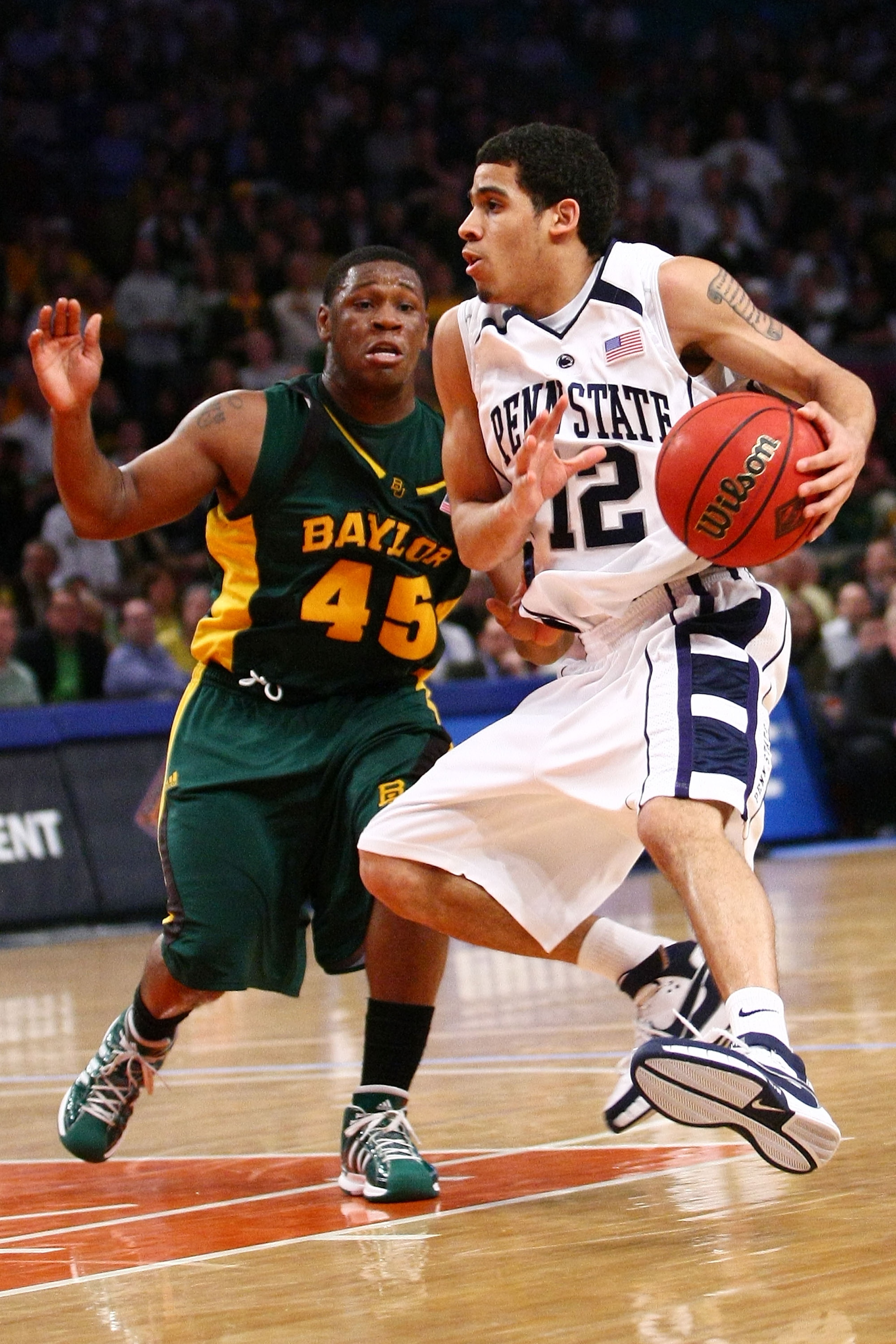 NEW YORK - APRIL 02:  Talor Battle #12 of the Penn State Nittany Lions drives past Tweety Carter #45 of the Baylor Bears during the NIT Championship match at Madison Square Garden on April 2, 2009 in New York, New York.  (Photo by Chris McGrath/Getty Imag