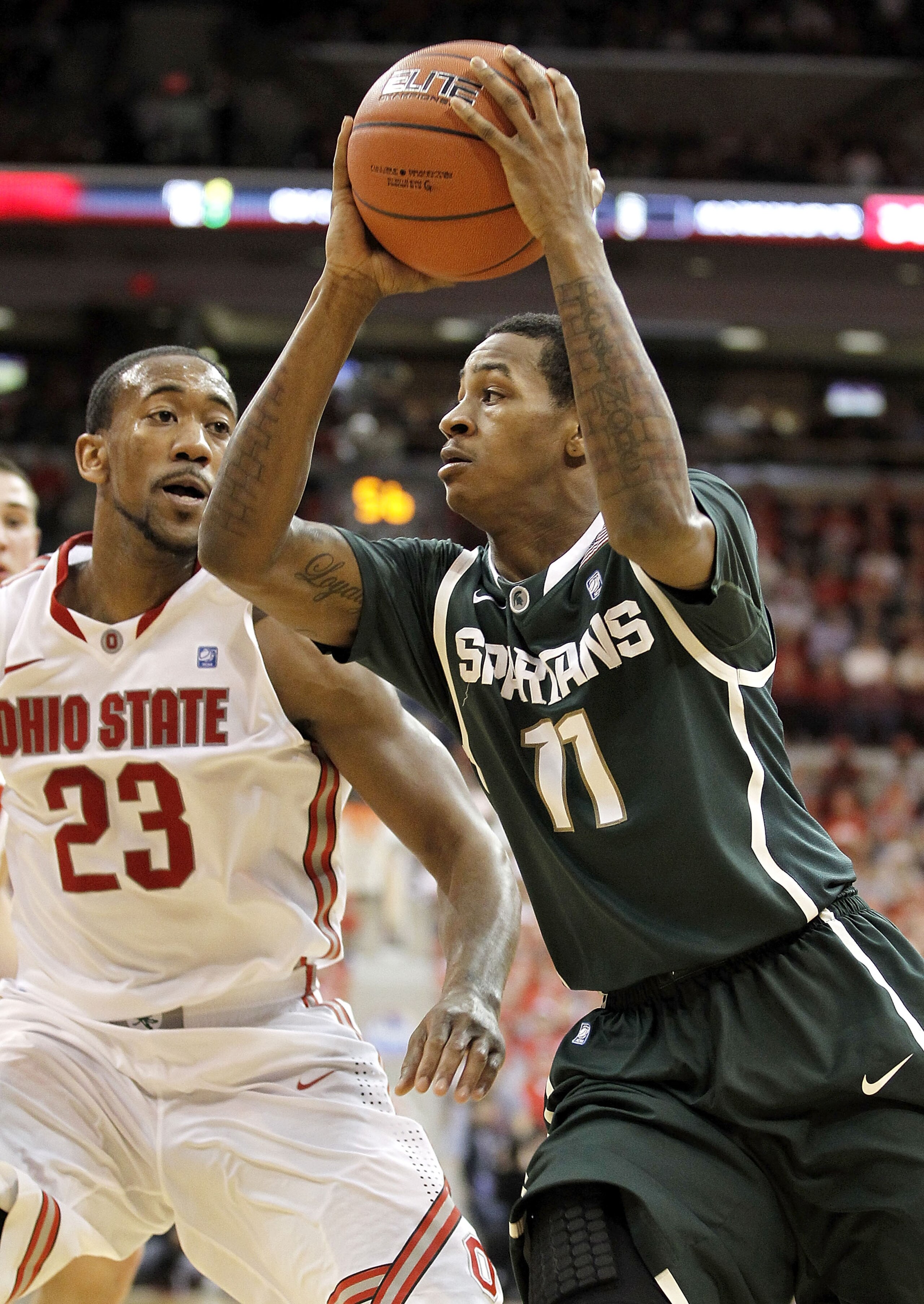 COLUMBUS, OH - FEBRUARY 15:  Keith Appling #11 of the Michigan State Spartans drives past David Lighty #23 of the Ohio State Buckeyes during the first half on February 15, 2011 at Value City Arena in Columbus, Ohio.  (Photo by Gregory Shamus/Getty Images)