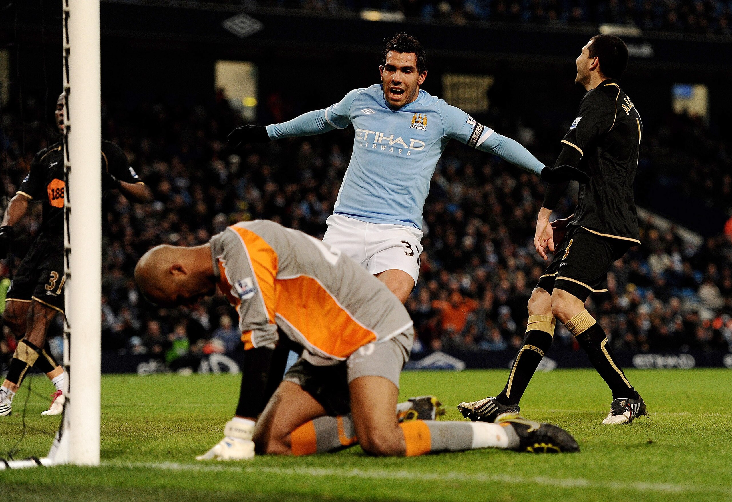 MANCHESTER, UNITED KINGDOM - MARCH 05:   Ali Al Habsi of Wigan Athletic reacts after David Silva of Manchester City scored the first goal during the Barclays Premier League match between Manchester City and Wigan Athletic at the City of Manchester Stadium