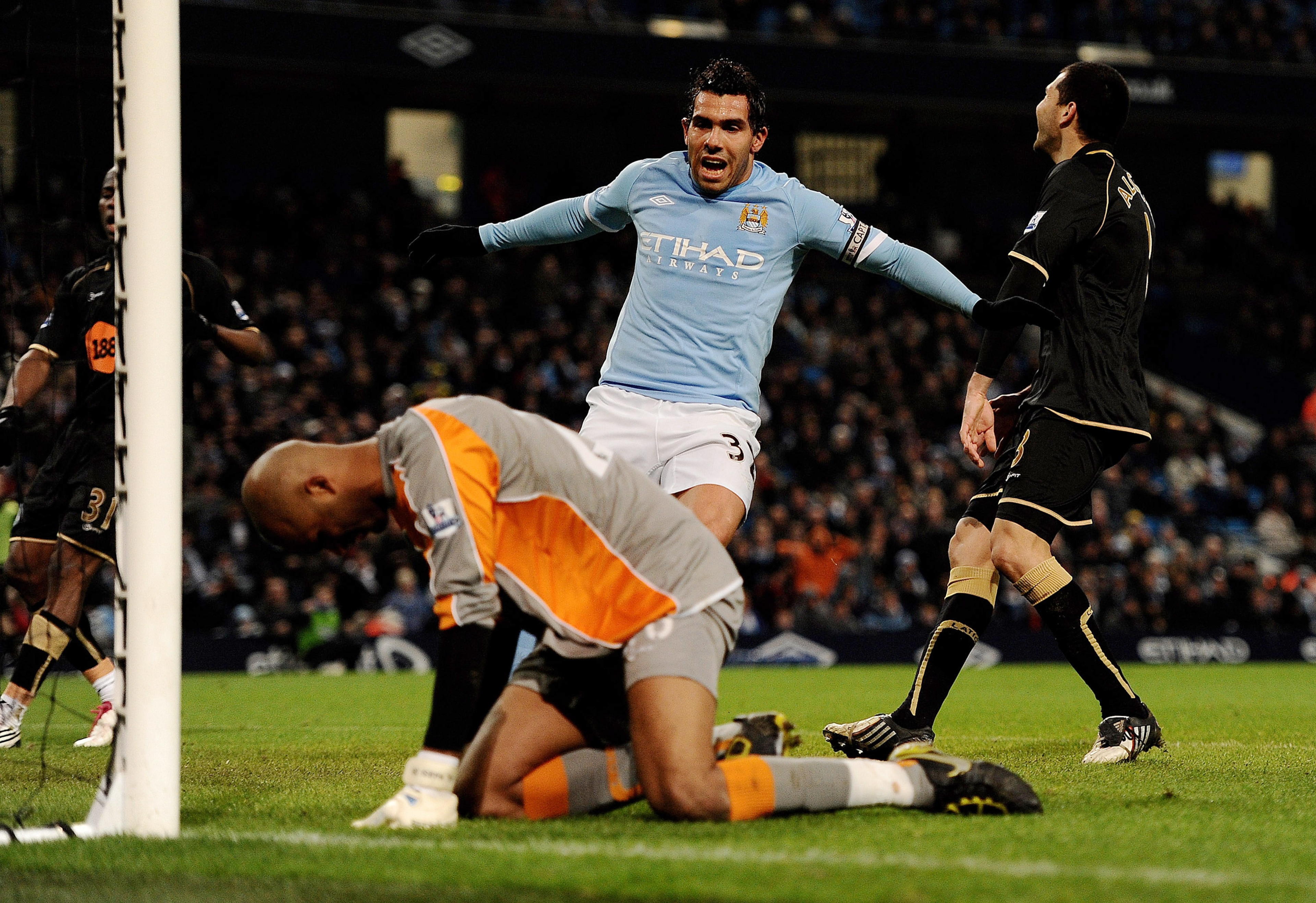 MANCHESTER, UNITED KINGDOM - MARCH 05:   Ali Al Habsi of Wigan Athletic reacts after David Silva of Manchester City scored the first goal during the Barclays Premier League match between Manchester City and Wigan Athletic at the City of Manchester Stadium