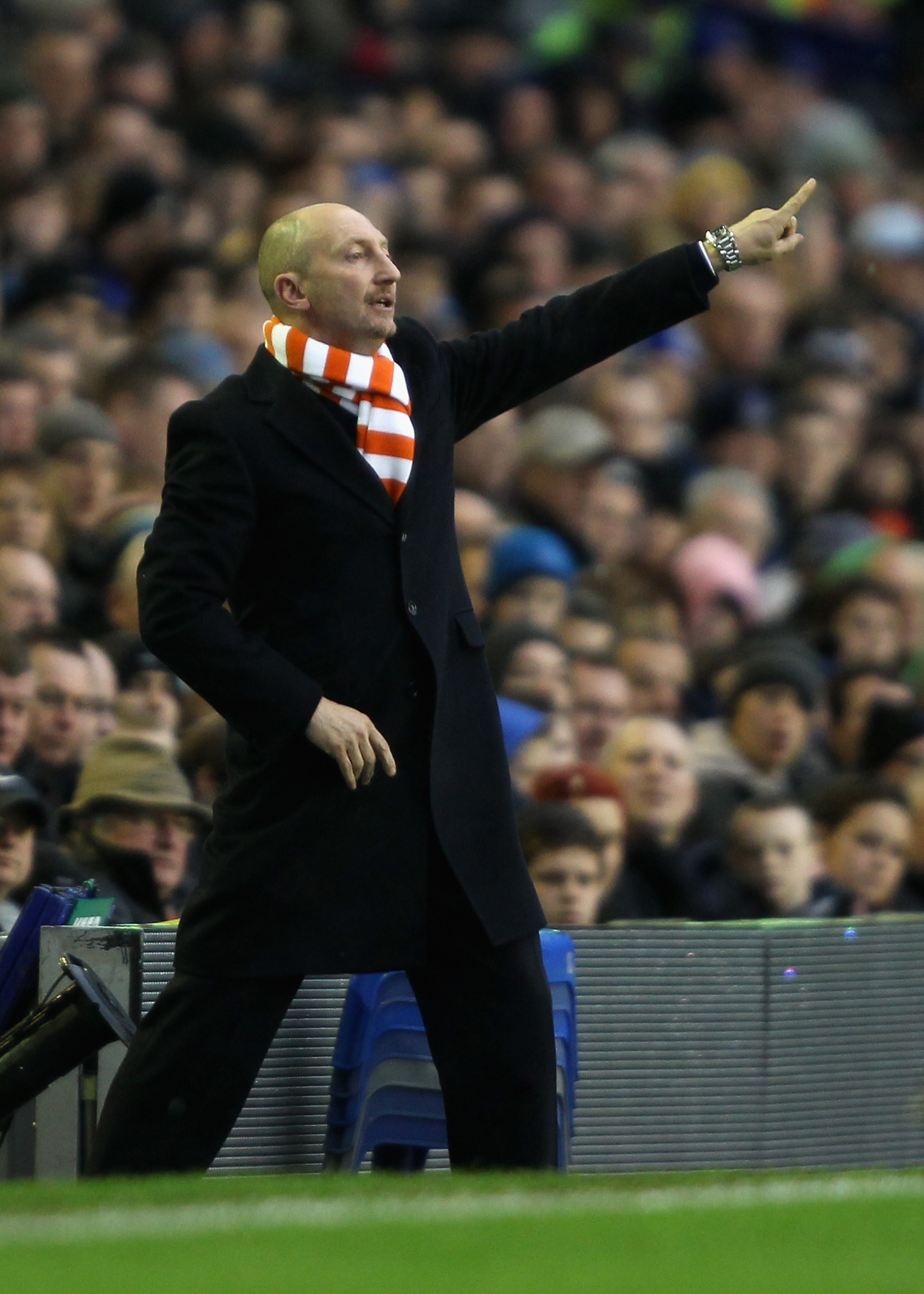 LIVERPOOL, ENGLAND - FEBRUARY 05:  Blackpool manager Ian Holloway shouts instructions to his team during the Barclays Premier League match between Everton and Blackpool at Goodison Park on February 5, 2011 in Liverpool, England.  (Photo by Clive Brunskill