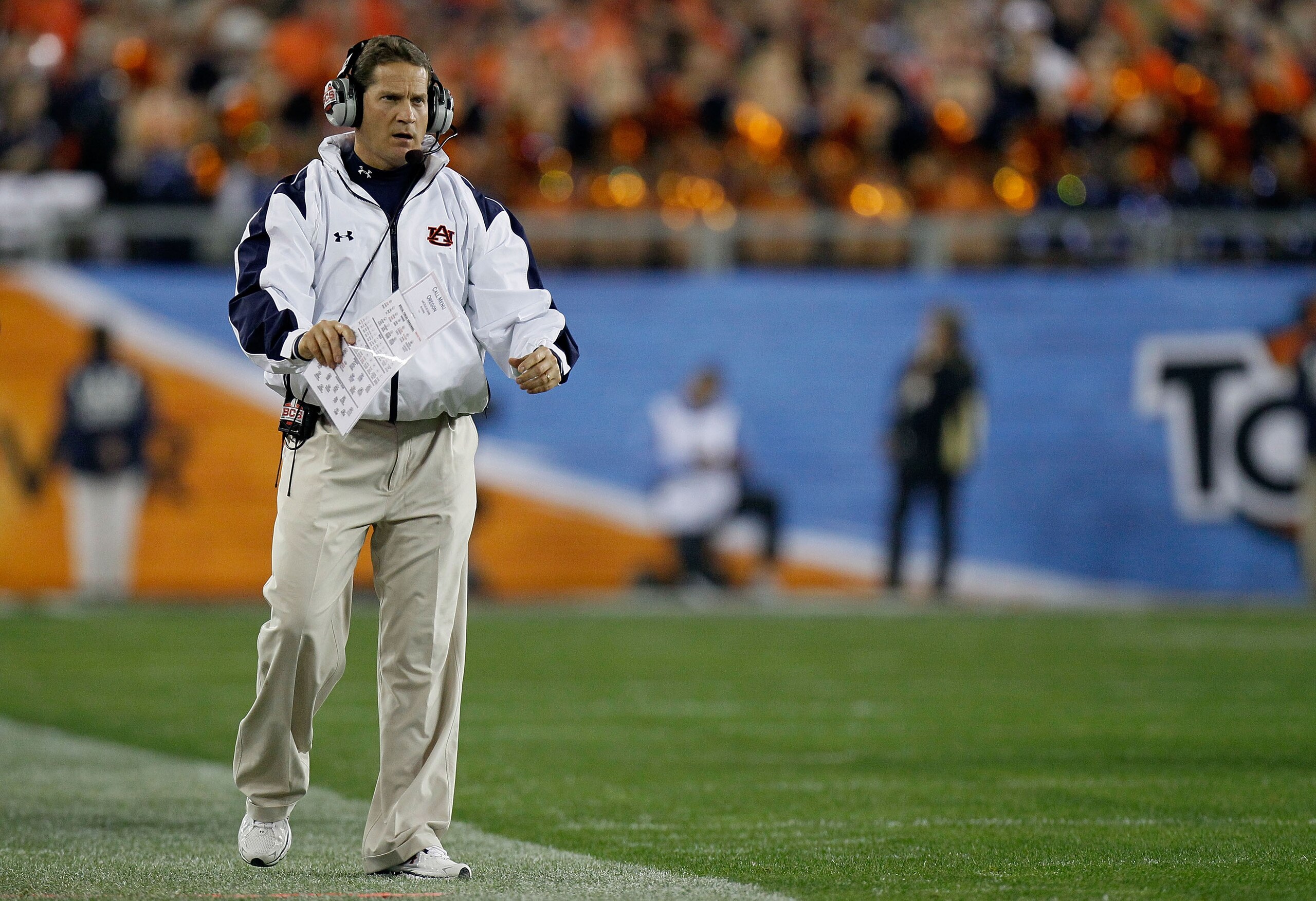 GLENDALE, AZ - JANUARY 10:  Head coach Gene Chizik of the Auburn Tigers reacts on the sideline against the Oregon Ducks during the Tostitos BCS National Championship Game at University of Phoenix Stadium on January 10, 2011 in Glendale, Arizona.  (Photo b