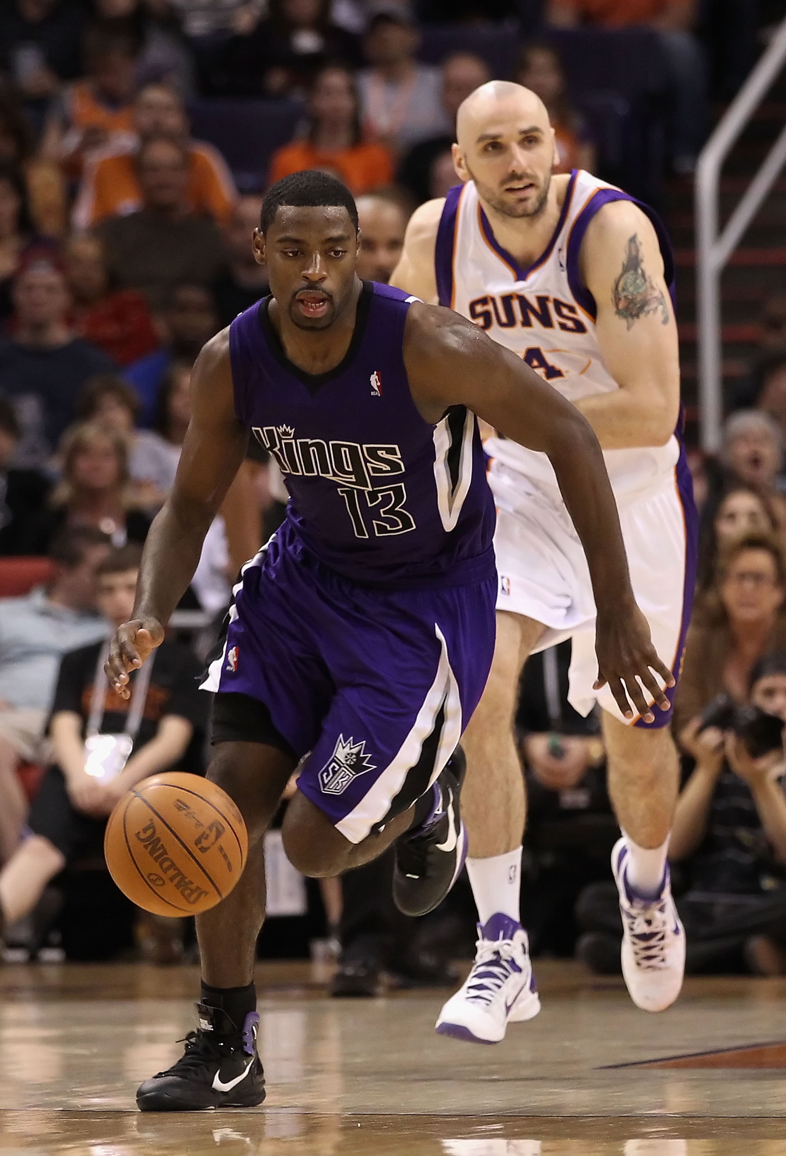 PHOENIX, AZ - FEBRUARY 13:  Tyreke Evans #13 of the Sacramento Kings handles the ball during the NBA game against the Phoenix Suns at US Airways Center on February 13, 2011 in Phoenix, Arizona.  NOTE TO USER: User expressly acknowledges and agrees that, b