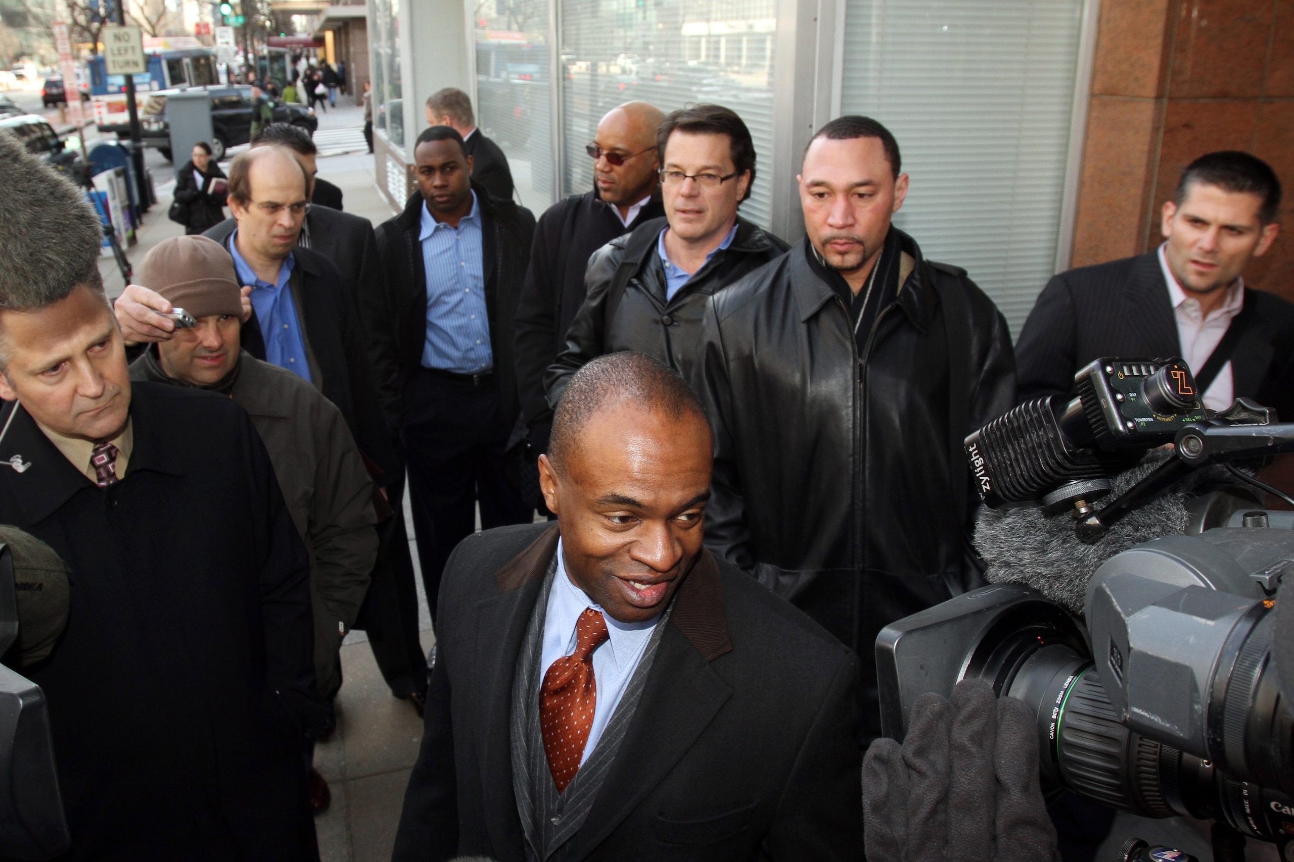 WASHINGTON, DC - MARCH 08: NNational Football League Players' Association (NFLPA) executive director DeMaurice Smith arrives with players for negotiations at the Federal Mediation and Conciliation Service building March 8, 2011 in Washington, DC. Represen