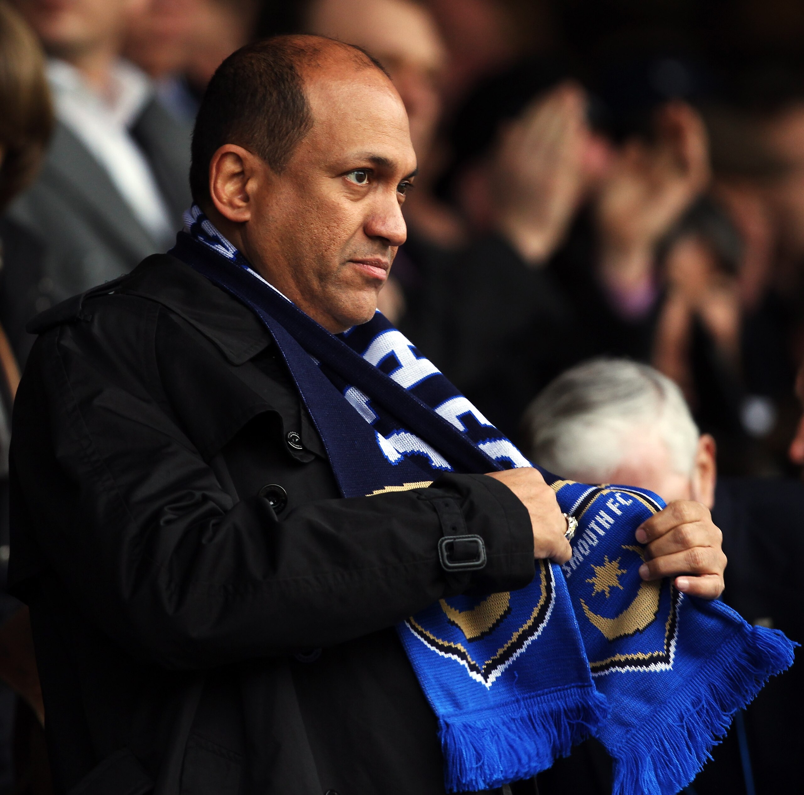 PORTSMOUTH, ENGLAND - MARCH 06: Owner Balram Chainrai of Portsmouth looks on prior to the E.ON sponsored FA Cup Quarter Final match between Portsmouth and Birmingham City at Fratton Park on March 6, 2010 in Portsmouth, England. (Photo by Bryn Lennon/Get PORTSMOUTH, ENGLAND - MARCH 06: Owner Balram Chainrai of Portsmouth looks on prior to the E.ON sponsored FA Cup Quarter Final match between Portsmouth and Birmingham City at Fratton Park on March 6, 2010 in Portsmouth, England. (Photo by Bryn Lennon/Get