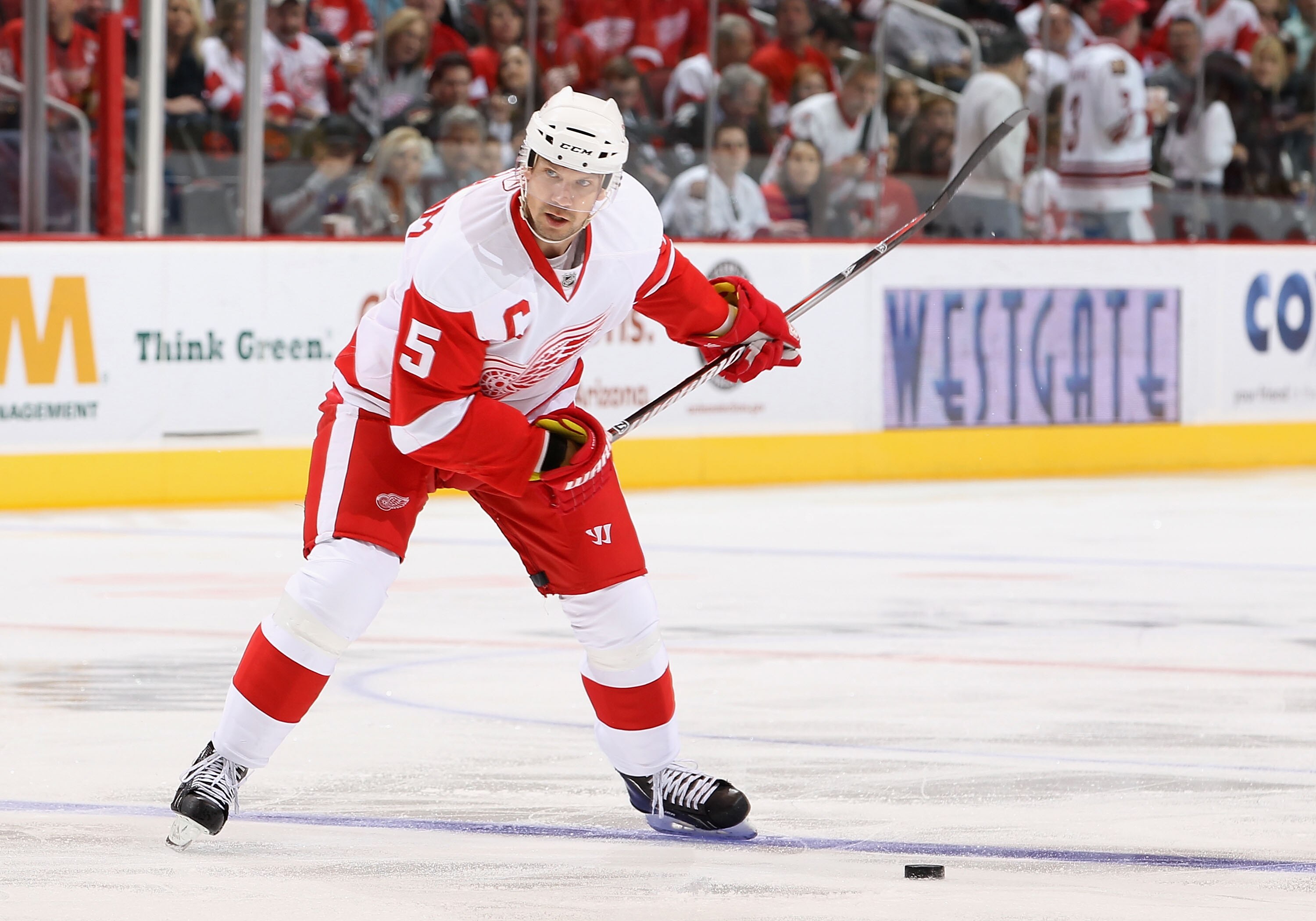 GLENDALE, AZ - MARCH 05:  Nicklas Lidstrom #5  of the Detroit Red Wings shoots the puck during the NHL game against the Phoenix Coyotes at Jobing.com Arena on March 5, 2011 in Glendale, Arizona. The Coyotes defeated the Red Wings 5-4 in an overtime shoot