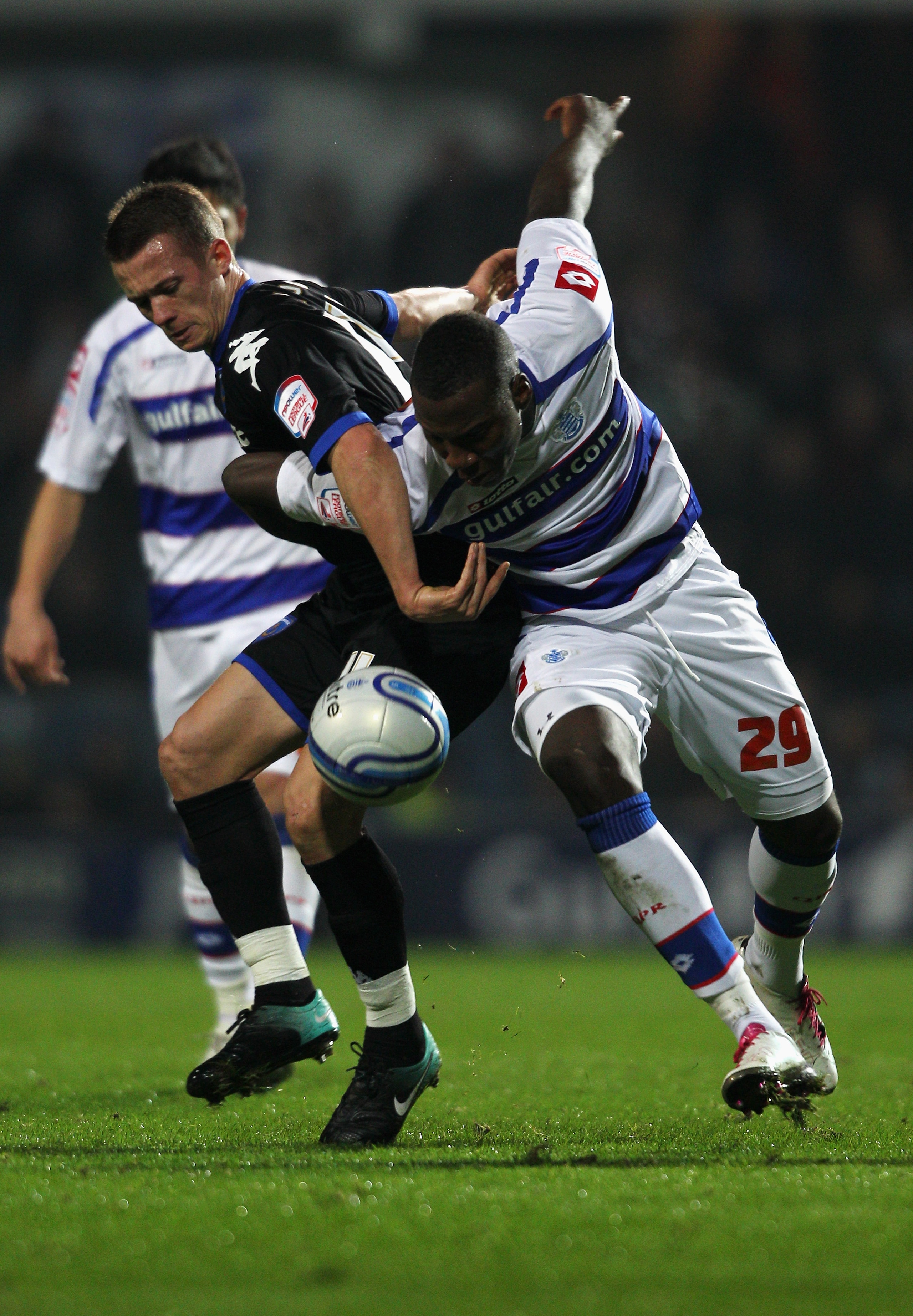 LONDON, ENGLAND - FEBRUARY 01: Ishmael Miller of QPR gets past Jonathan Hogg of Portsmouth during the npower Championship match between Queens Park Rangers and Portsmouth at Loftus Road on February 1, 2011 in London, England. (Photo by Dean Mouhtaropoul LONDON, ENGLAND - FEBRUARY 01: Ishmael Miller of QPR gets past Jonathan Hogg of Portsmouth during the npower Championship match between Queens Park Rangers and Portsmouth at Loftus Road on February 1, 2011 in London, England. (Photo by Dean Mouhtaropoul