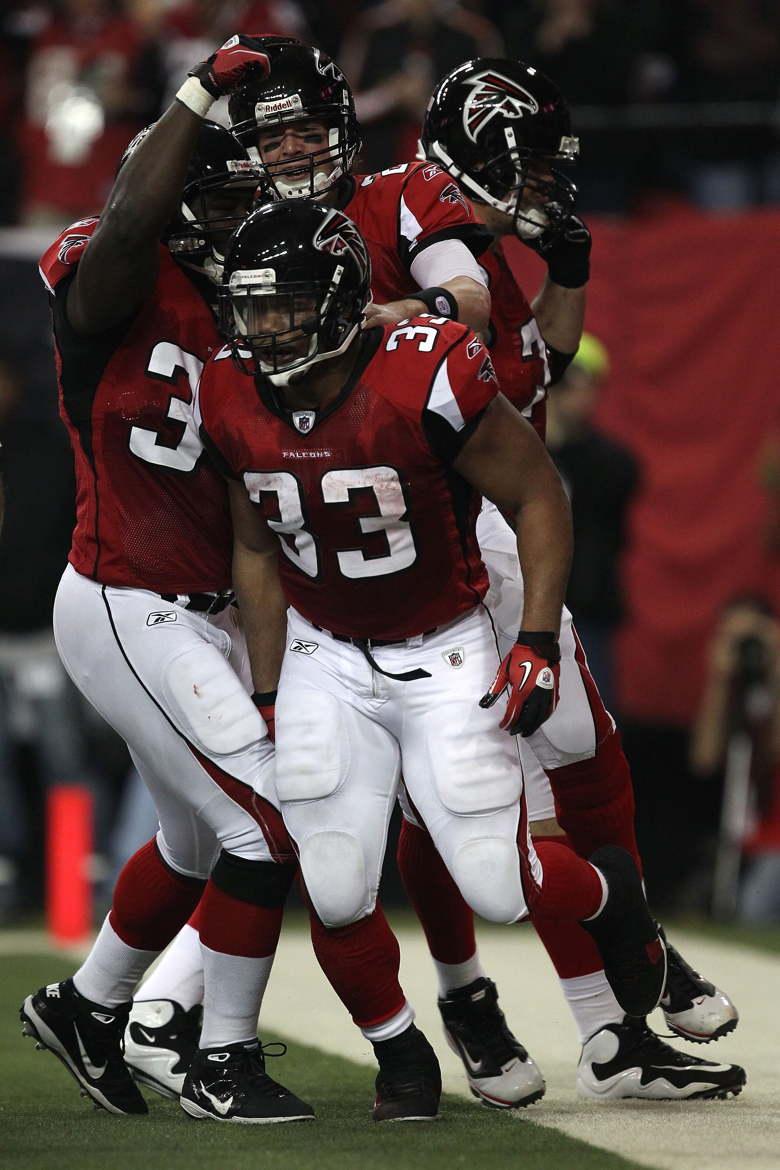 ATLANTA, GA - JANUARY 15:  Michael Turner #33 of the Atlanta Falcons reacts after he scroed a touchdown in the first quarter against the Green Bay Packers during their 2011 NFC divisional playoff game at Georgia Dome on January 15, 2011 in Atlanta, Georgi