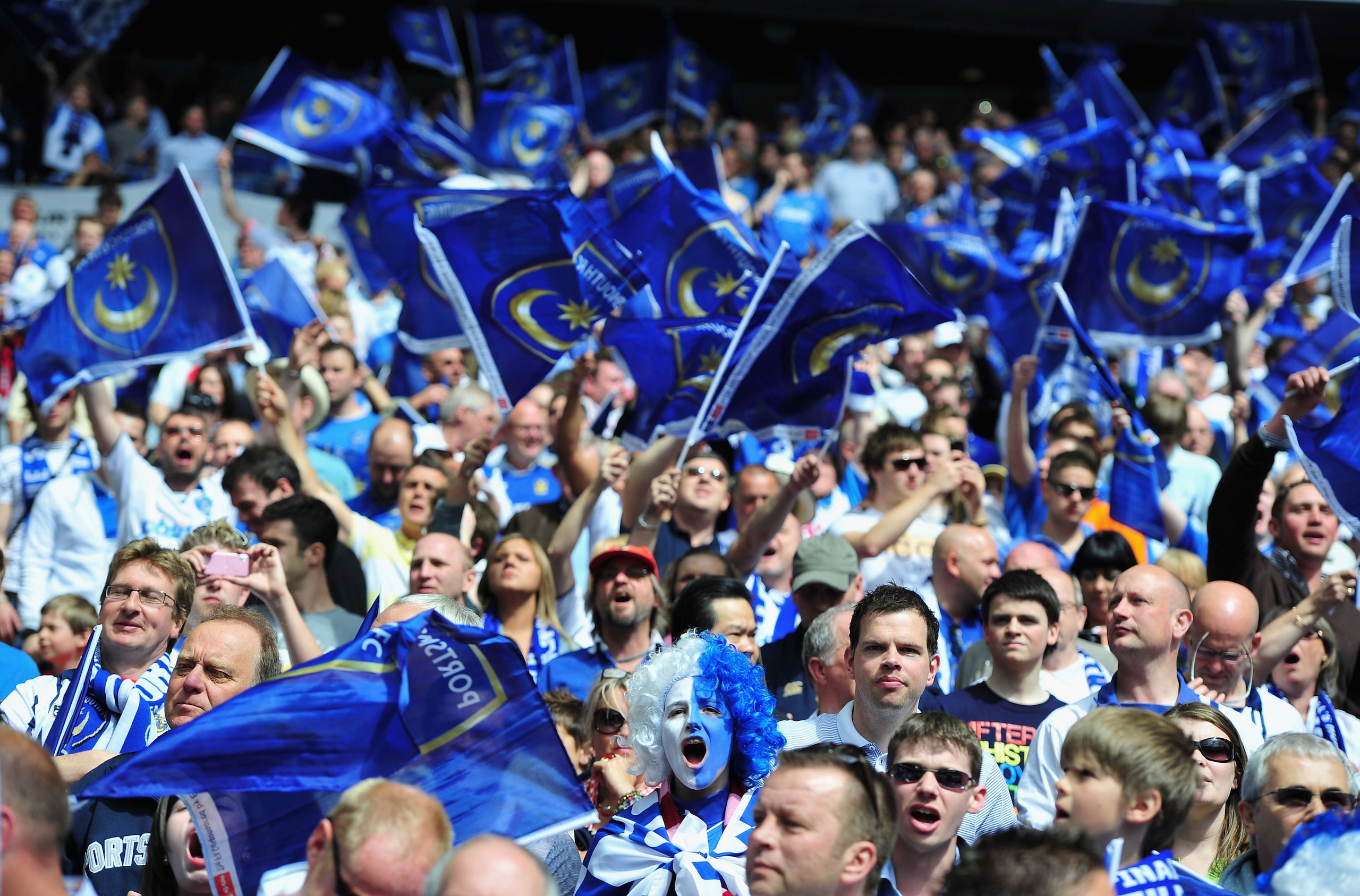 LONDON, ENGLAND - MAY 15: Portsmouth fans show their support during the FA Cup sponsored by E.ON Final match between Chelsea and Portsmouth at Wembley Stadium on May 15, 2010 in London, England. (Photo by Clive Mason/Getty Images) LONDON, ENGLAND - MAY 15: Portsmouth fans show their support during the FA Cup sponsored by E.ON Final match between Chelsea and Portsmouth at Wembley Stadium on May 15, 2010 in London, England. (Photo by Clive Mason/Getty Images)
