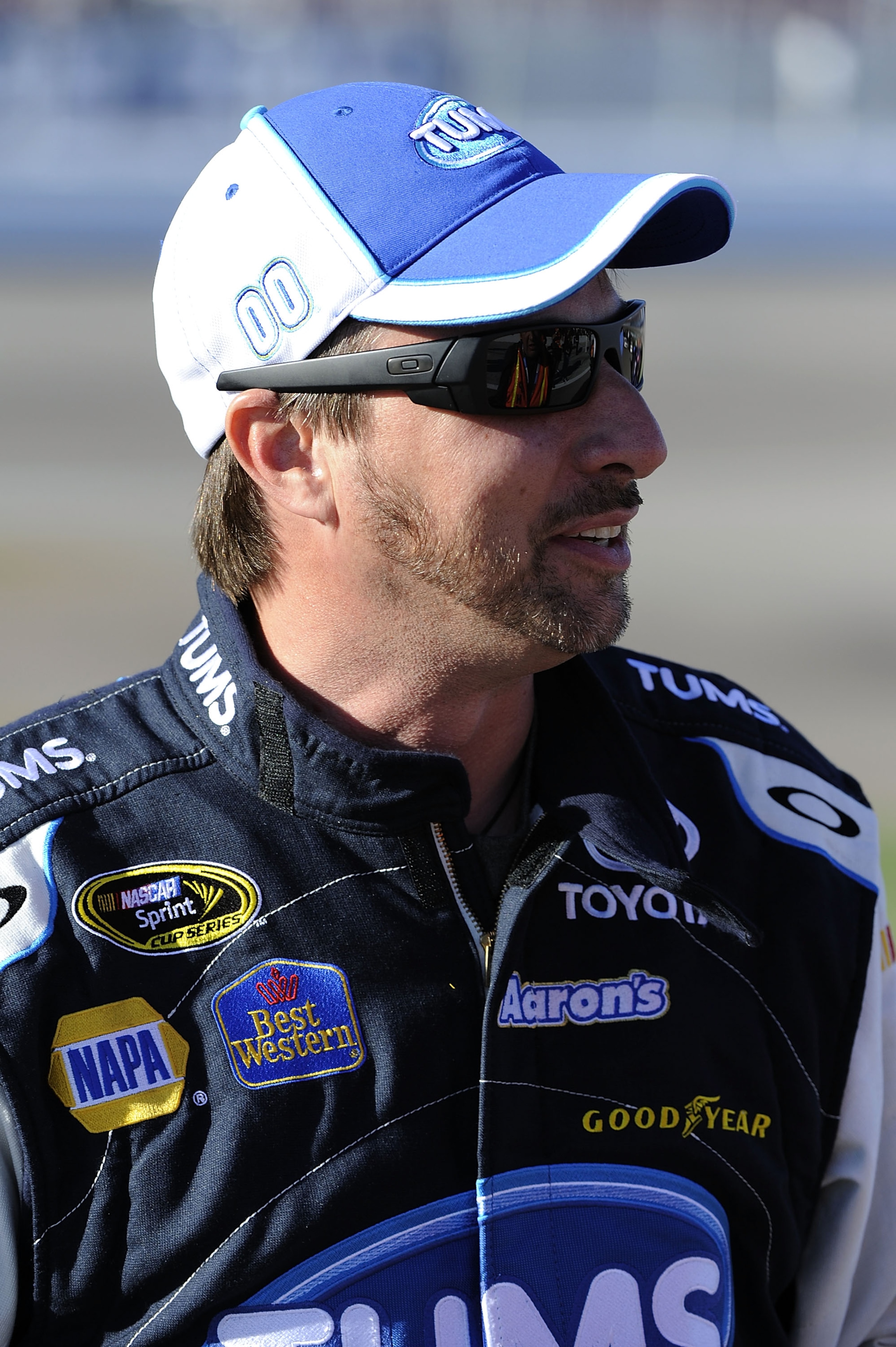 LAS VEGAS, NV - MARCH 04:  David Reutimann, driver of the #00 TUMS Toyota, stands on pit road during qualifying for the NASCAR Sprint Cup Series Kobalt Tools 400 at Las Vegas Motor Speedway on March 4, 2011 in Las Vegas, Nevada.  (Photo by John Harrelson/