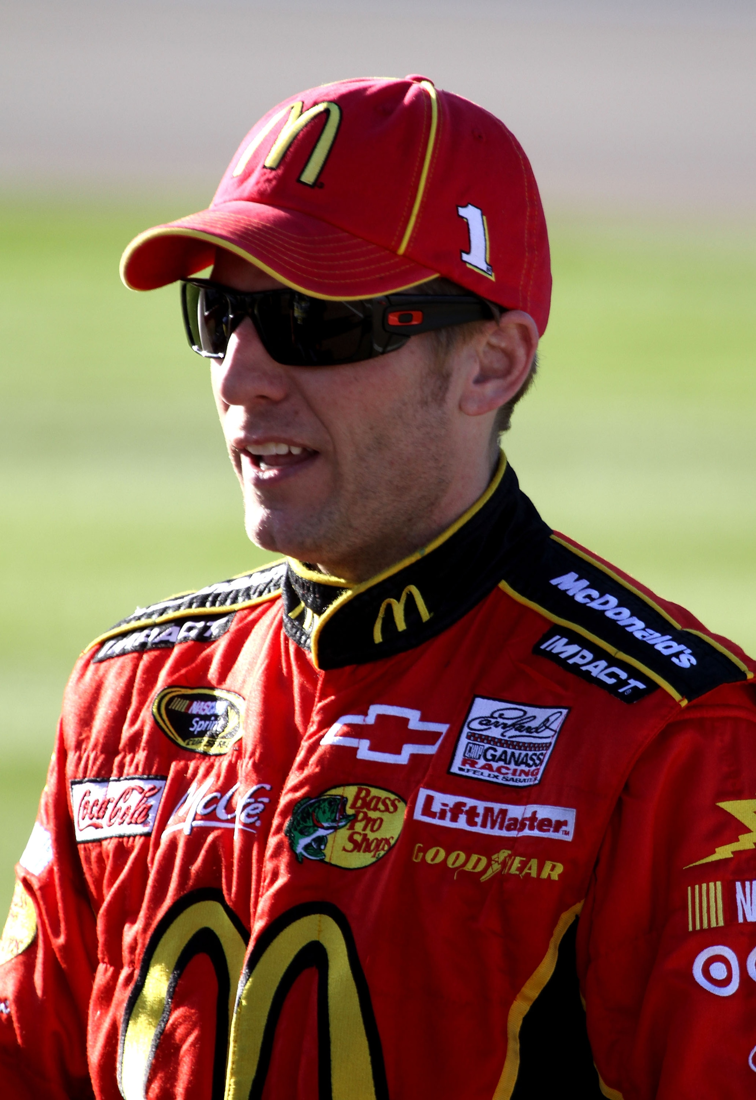 LAS VEGAS, NV - MARCH 04:  Jamie McMurray, driver of the #1 McDonald's Chevrolet, walks on the grid during qualifying for the NASCAR Sprint Cup Series Kobalt Tools 400 at Las Vegas Motor Speedway on March 4, 2011 in Las Vegas, Nevada.  (Photo by Jerry Mar