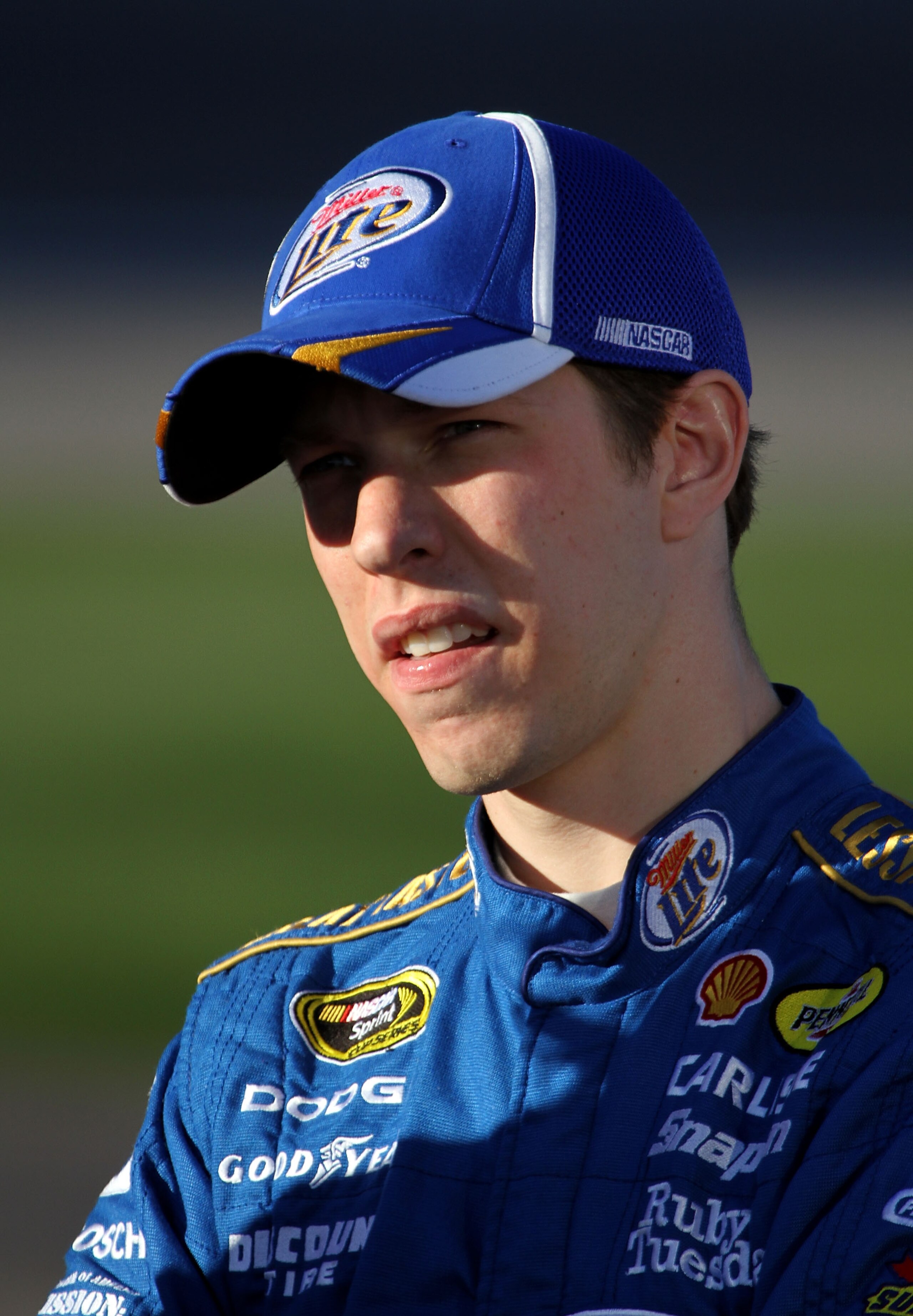 LAS VEGAS, NV - MARCH 04:  Brad Keselowski, driver of the #2 Miller Lite Dodge, stands on the grid during qualifying for the NASCAR Sprint Cup Series Kobalt Tools 400 at Las Vegas Motor Speedway on March 4, 2011 in Las Vegas, Nevada.  (Photo by Jerry Mark