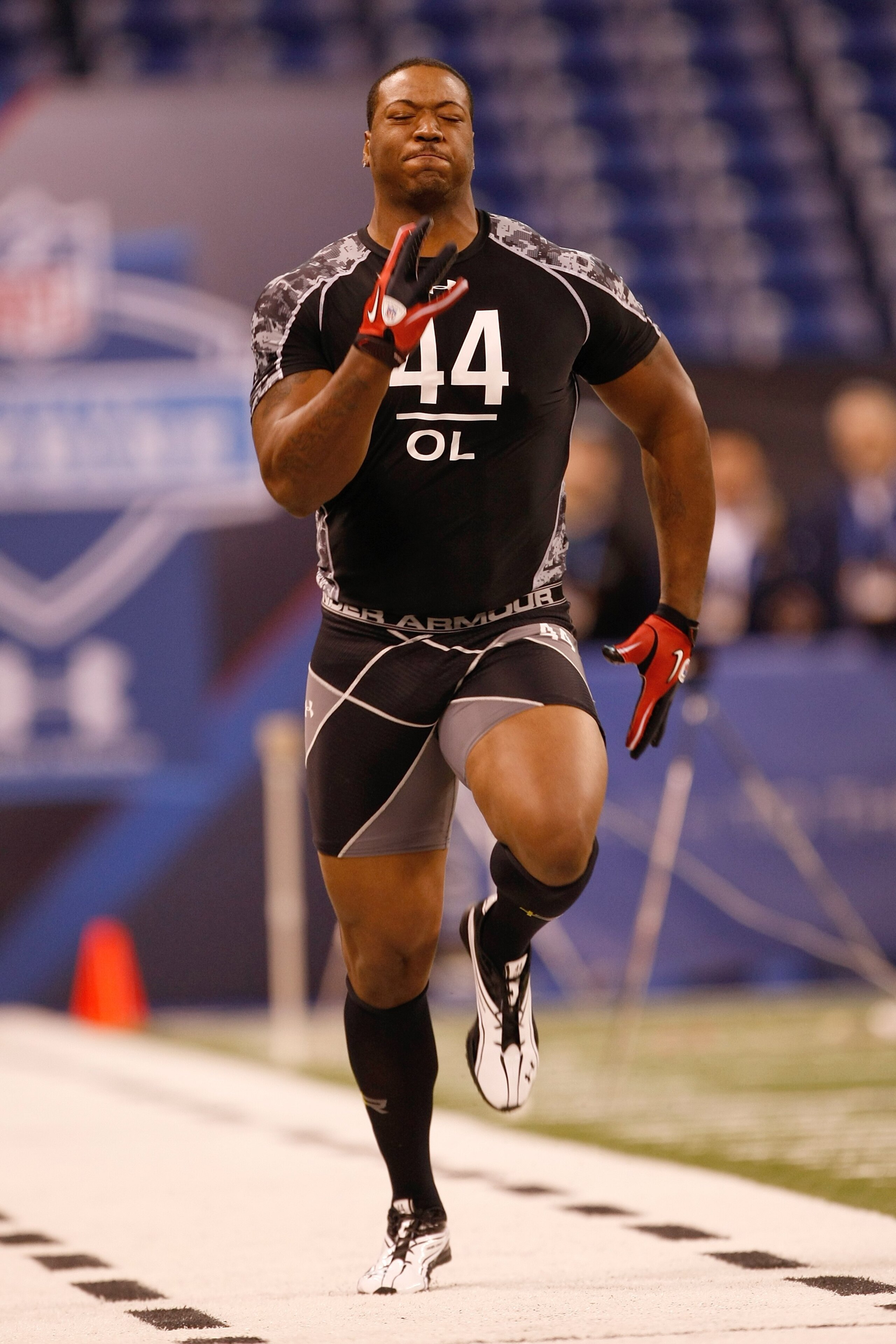 INDIANAPOLIS, IN - FEBRUARY 27: Offensive lineman Tony Washington of Abiline Christian runs the 40 yard dash during the NFL Scouting Combine presented by Under Armour at Lucas Oil Stadium on February 27, 2010 in Indianapolis, Indiana. (Photo by Scott Boeh