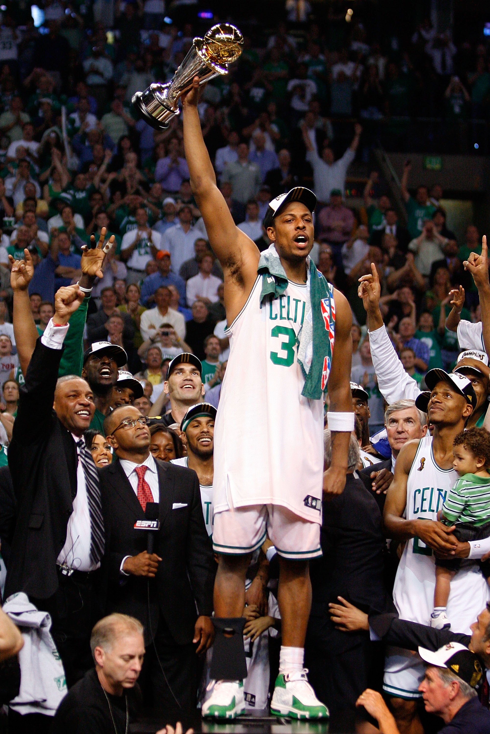 BOSTON - JUNE 17:  Paul Pierce #34 of the Boston Celtics celebrates with the Finals MVP trophy at the end of Game Six of the 2008 NBA Finals against the Los Angeles Lakers on June 17, 2008 at TD Banknorth Garden in Boston, Massachusetts. The Celtics defea