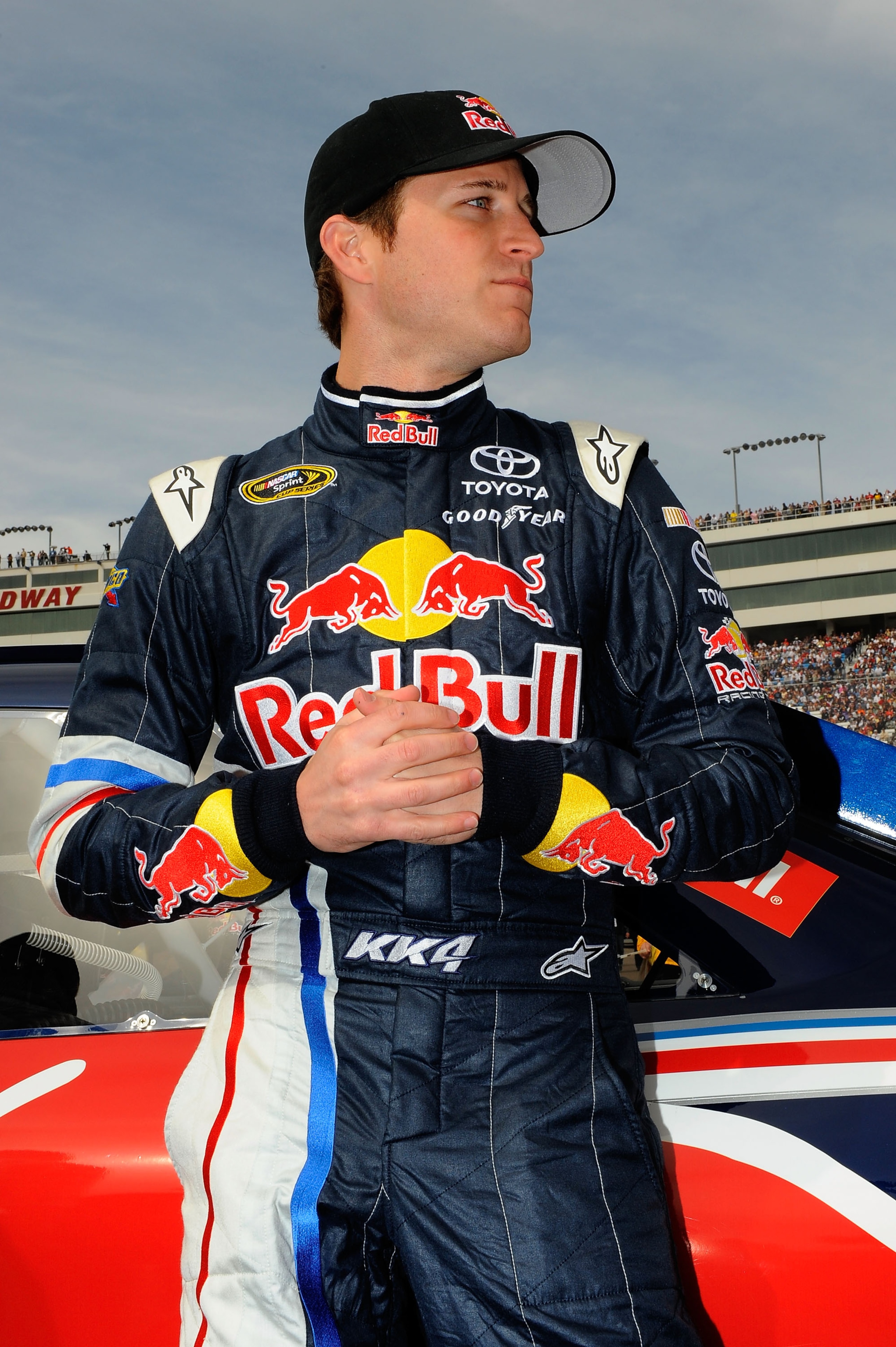 LAS VEGAS, NV - MARCH 06:  Kasey Kahne, driver of the #4 Red Bull Toyota, stands next to his car on the grid prior to the NASCAR Sprint Cup Series Kobalt Tools 400 at Las Vegas Motor Speedway on March 6, 2011 in Las Vegas, Nevada.  (Photo by Jared C. Tilt