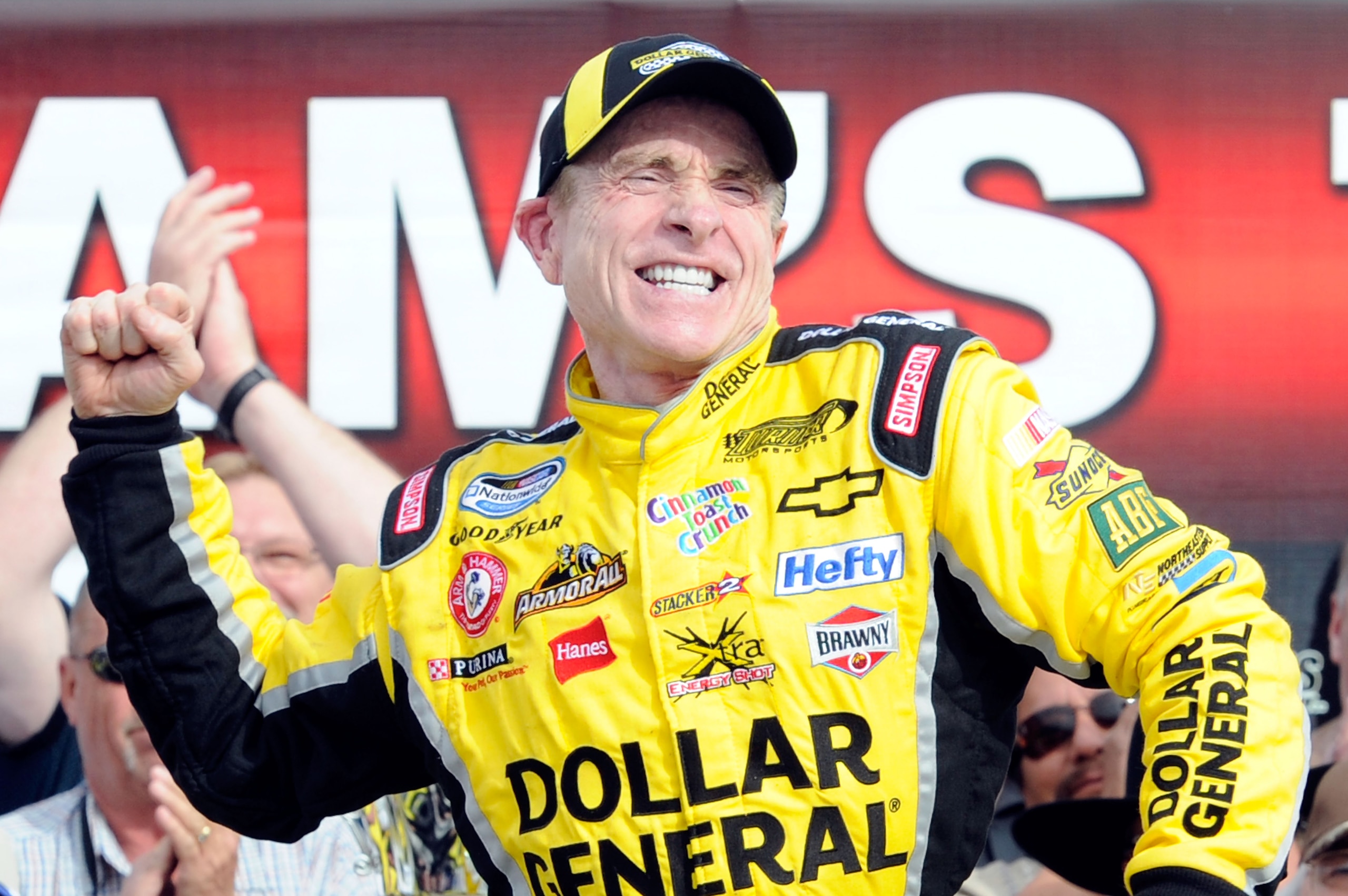 LAS VEGAS, NV - MARCH 05:  Mark Martin, driver of the #32 Dollar General Chevrolet, celebrates in Victory Lane after winning the NASCAR Nationwide Series Sam's Town 300 at Las Vegas Motor Speedway on March 5, 2011 in Las Vegas, Nevada.  (Photo by John Har