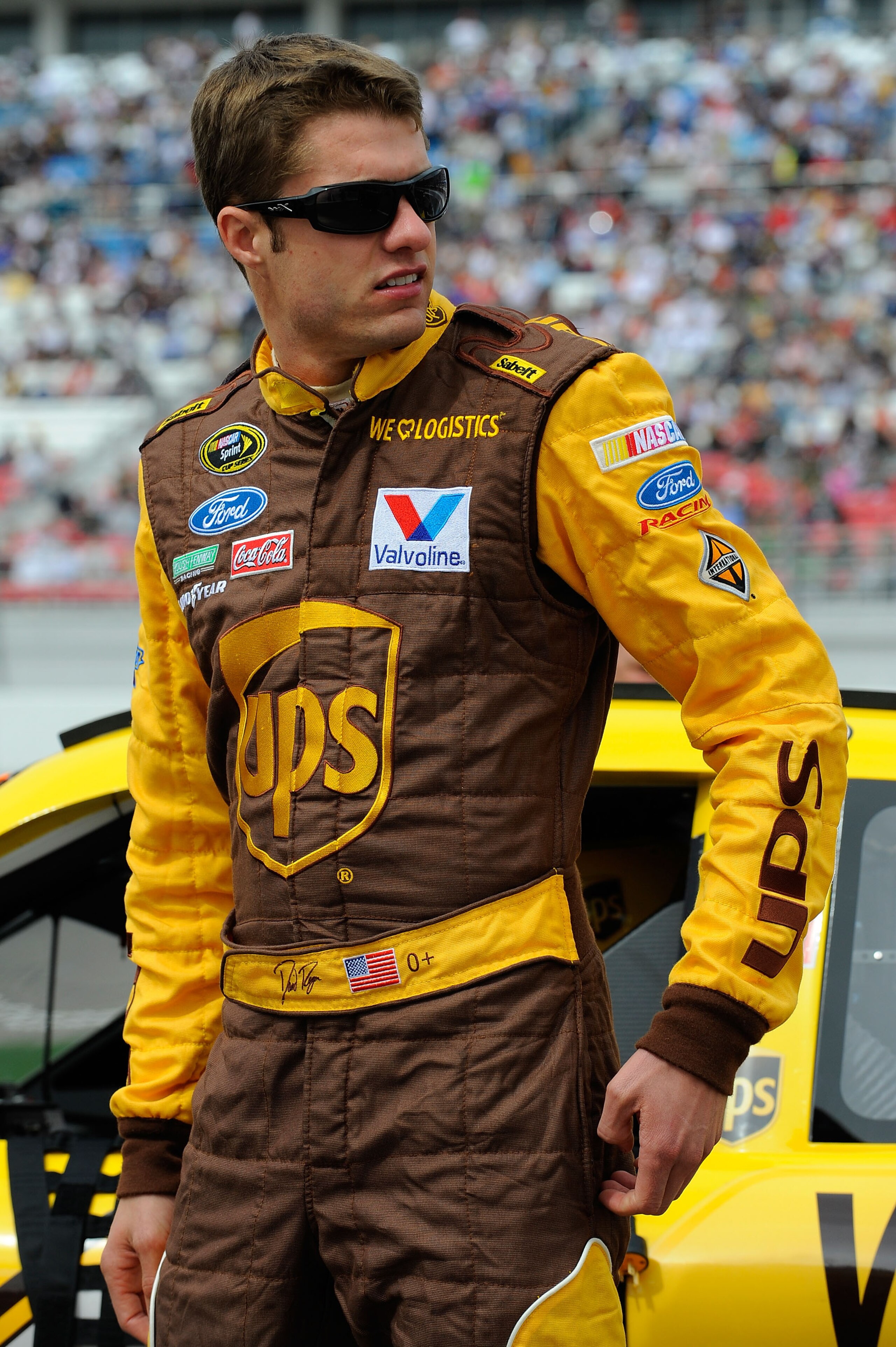 LAS VEGAS, NV - MARCH 06:  David Ragan, driver of the #6 UPS Ford, stands on the grid prior to the NASCAR Sprint Cup Series Kobalt Tools 400 at Las Vegas Motor Speedway on March 6, 2011 in Las Vegas, Nevada.  (Photo by Jared C. Tilton/Getty Images for NAS