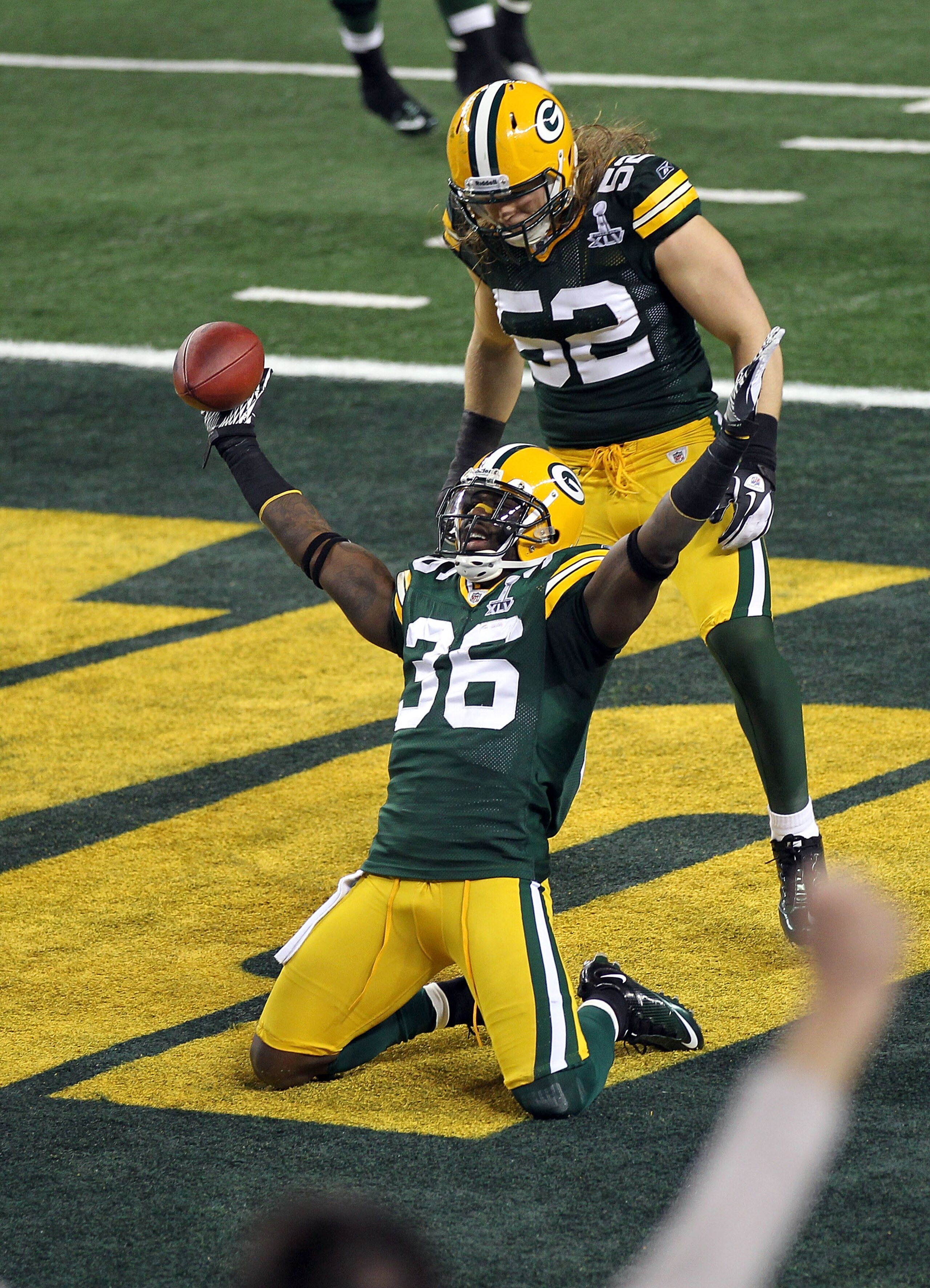 ARLINGTON, TX - FEBRUARY 06:  Nick Collins #36 of the Green Bay Packers celebrates with teammate Clay Matthews #52 after Collins returned an interception for a touchdown against the Pittsburgh Steelers during Super Bowl XLV at Cowboys Stadium on February