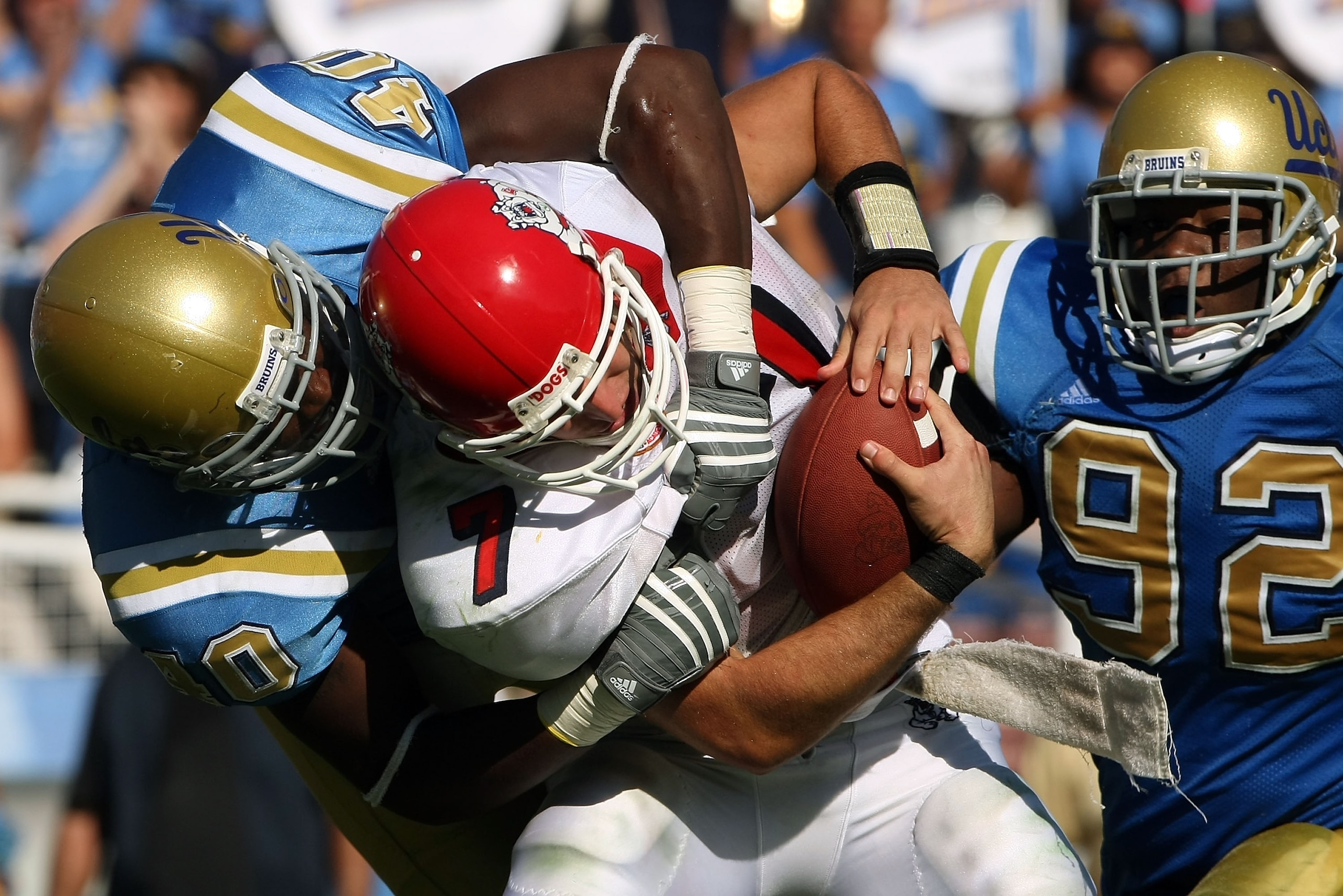 PASADENA, CA - SEPTEMBER 27: Quarterback Tom Brandstater #7 of the Frenso State Bulldogs is sacked by Akeem Ayers #40 of the UCLA Bruins during the game on September 27, 2008 at the Rose Bowl in Pasadena, California. Fresno State defeated UCLA 36-31. ( PASADENA, CA - SEPTEMBER 27: Quarterback Tom Brandstater #7 of the Frenso State Bulldogs is sacked by Akeem Ayers #40 of the UCLA Bruins during the game on September 27, 2008 at the Rose Bowl in Pasadena, California. Fresno State defeated UCLA 36-31. (