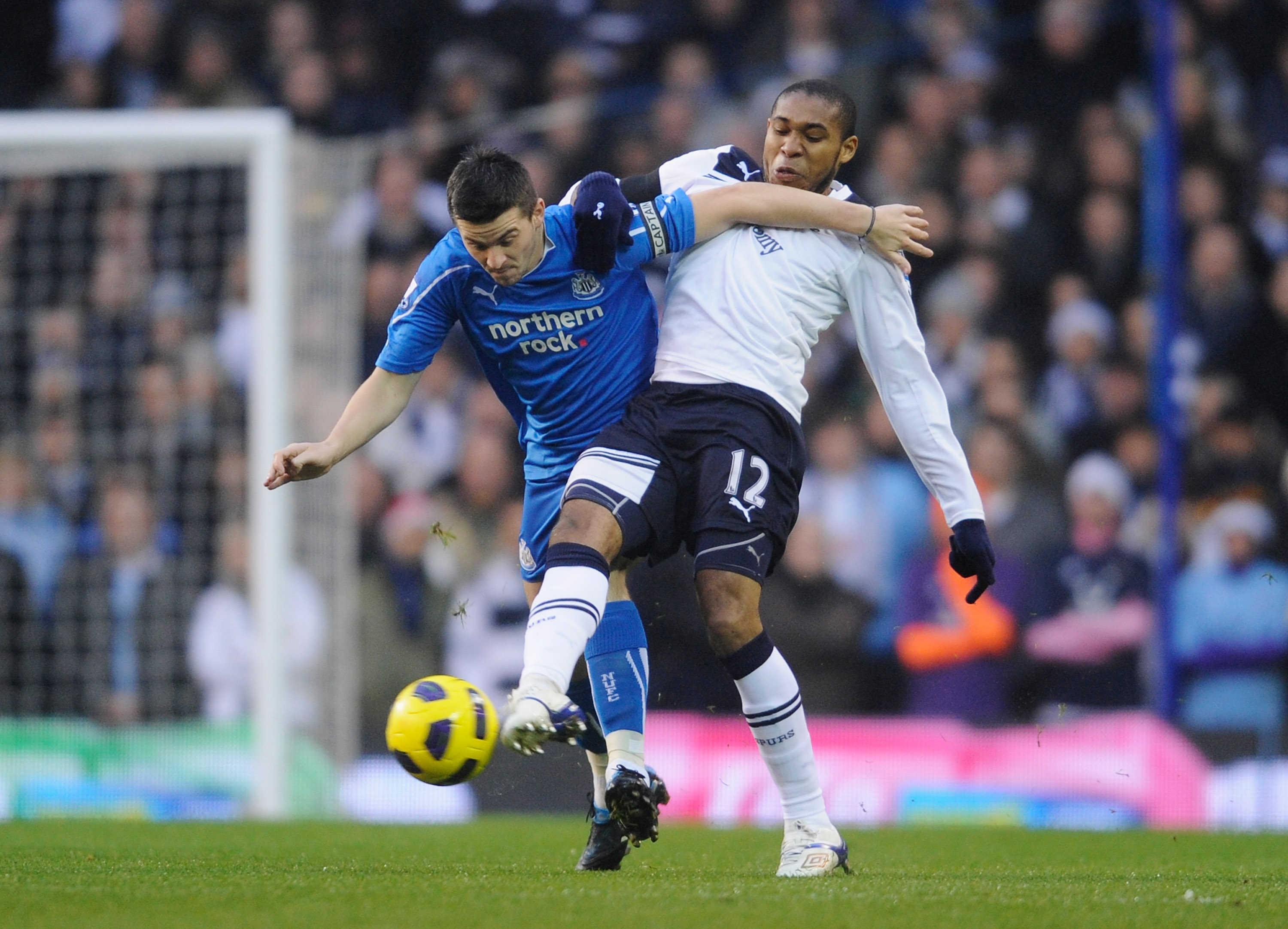 LONDON, ENGLAND - DECEMBER 28: Wilson Palacios of Tottenham Hotspur challenges Joey Barton of Newcastle United during the Barclays Premier League match between Tottenham Hotspur and Newcastle United at White Hart Lane on December 28, 2010 in London, Engla