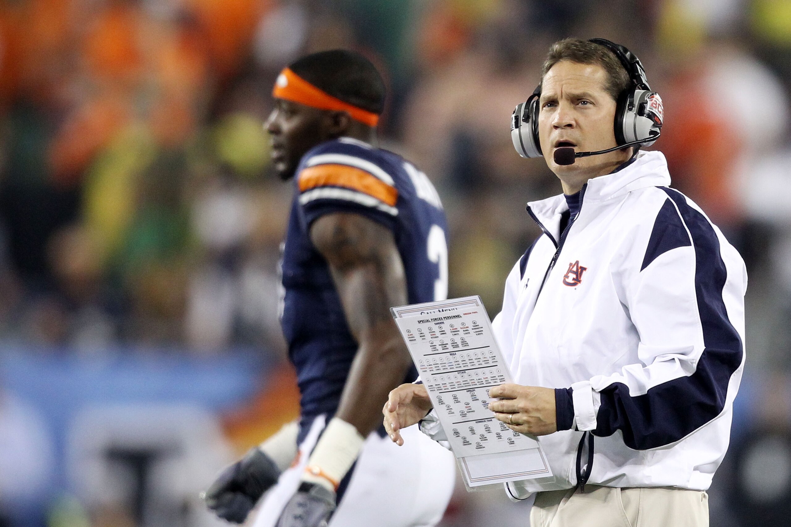 GLENDALE, AZ - JANUARY 10:  Head coach Gene Chizik of the Auburn Tigers looks  on from the sideline against the Oregon Ducks during the Tostitos BCS National Championship Game at University of Phoenix Stadium on January 10, 2011 in Glendale, Arizona.  (Ph