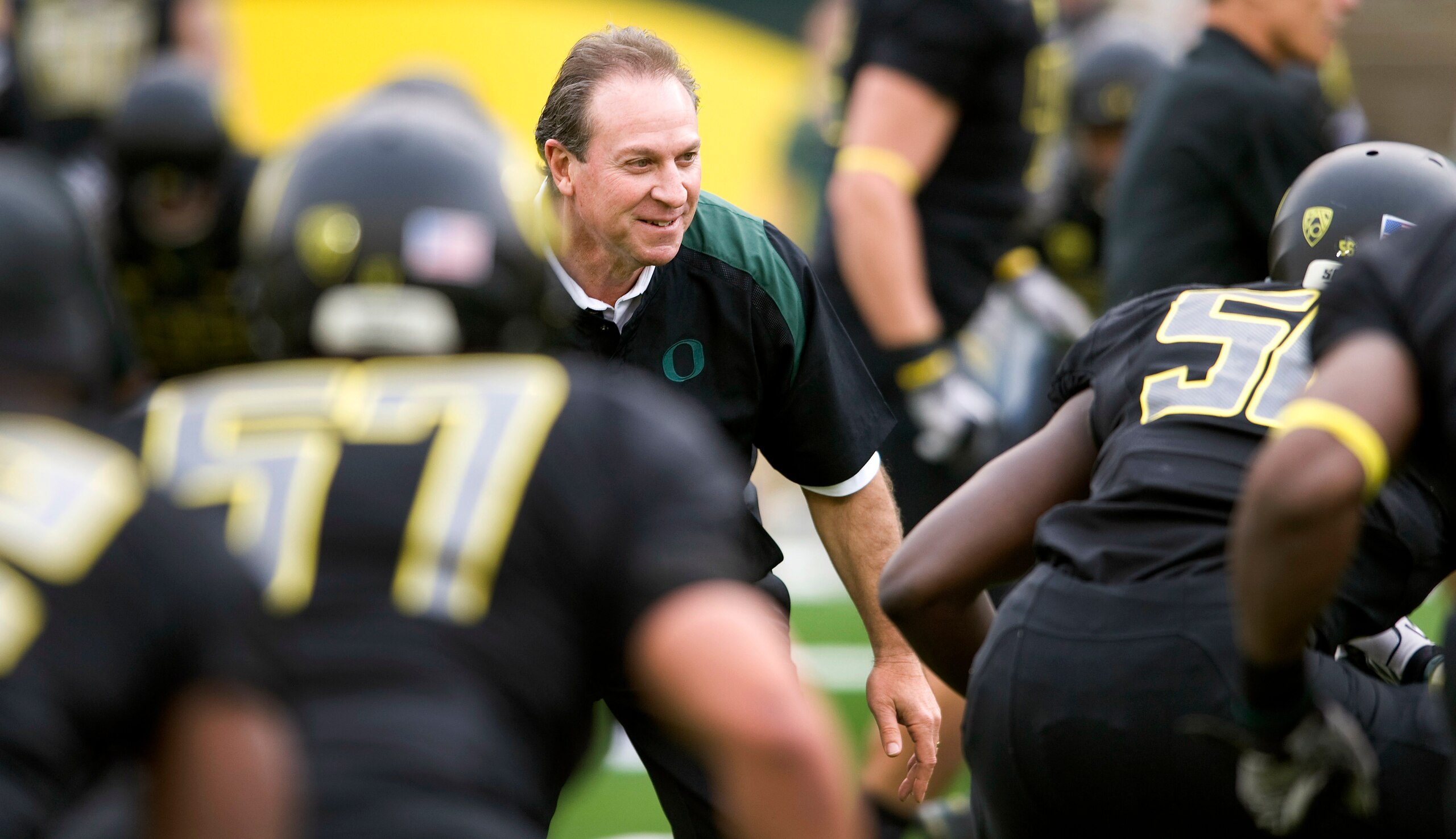 EUGENE, OR - NOVEMBER 6: Defensive coordinator Nick Aliotti of the Oregon Ducks warms up with his players before the game against the Washington Huskies at Autzen Stadium on November 6, 2010 in Eugene, Oregon. (Photo by Steve Dykes/Getty Images)