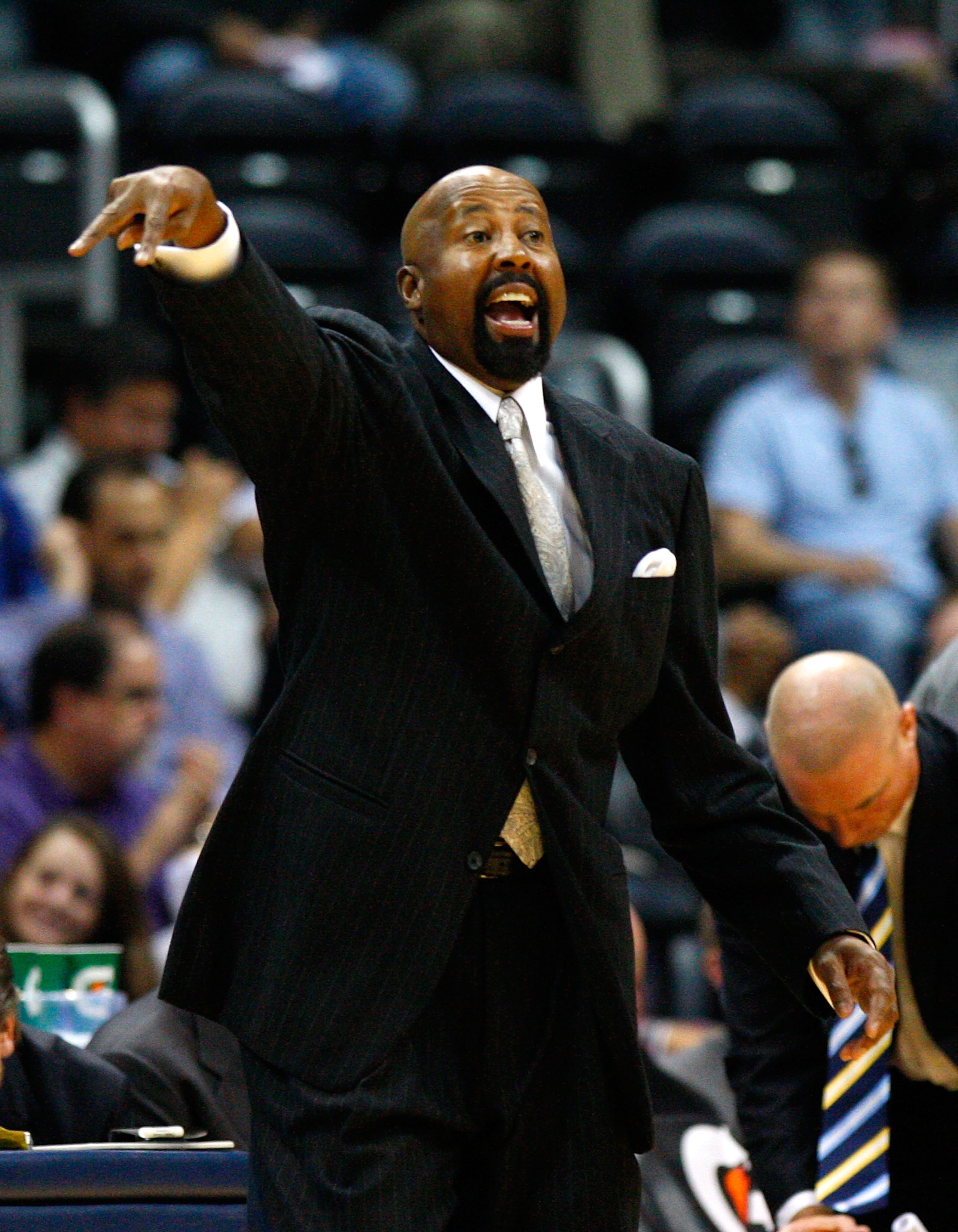 ATLANTA - OCTOBER 28:  Head coach Mike Woodson of the Atlanta Hawks yells to his team against the Indiana Pacers at Philips Arena on October 28, 2009 in Atlanta, Georgia.  (Photo by Kevin C. Cox/Getty Images)