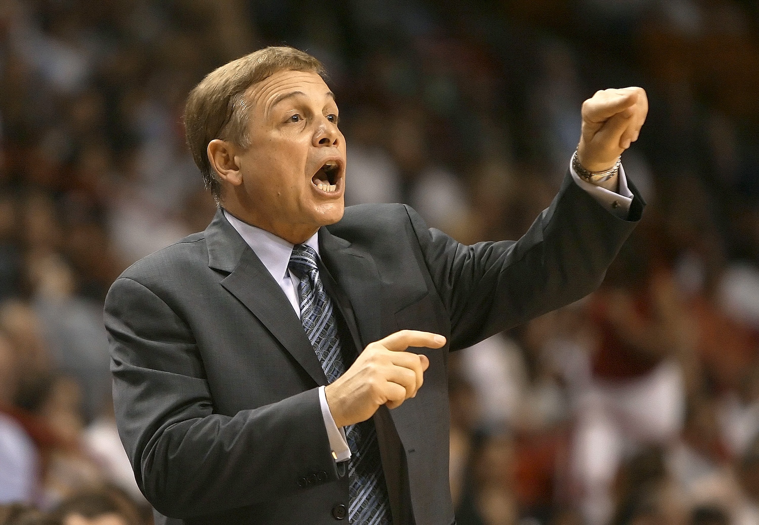 MIAMI - DECEMBER 16:  Head coach Mike Fratello of the Memphis Grizzlies calls out plays to his team in the first half against the Miami Heat at American Airlines Arena on December 16, 2006 in Miami, Florida. The Heat defeated the Grizzlies 98-90. NOTE TO