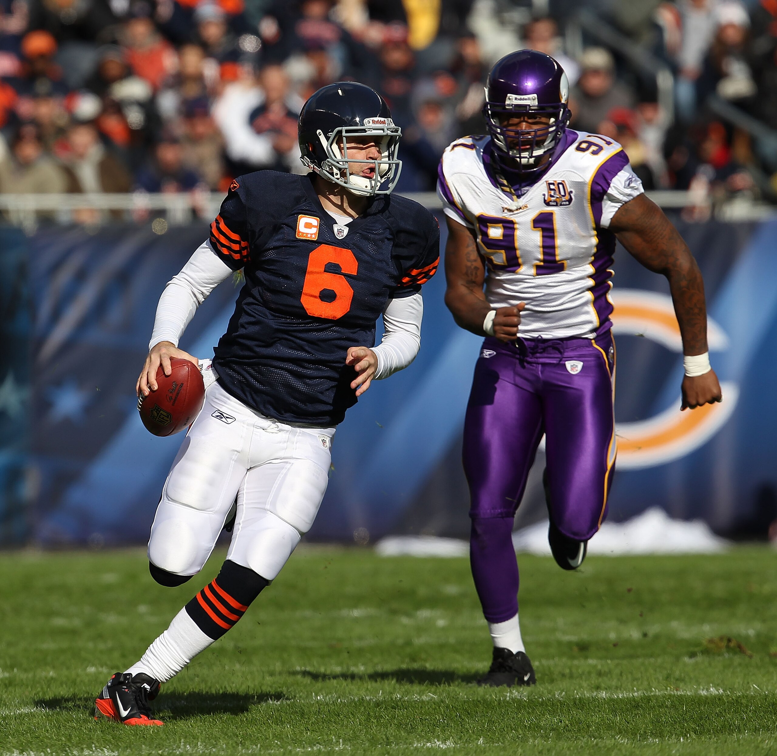 CHICAGO - NOVEMBER 14: Jay Cutler #6 of the Chicago Bears runs for a first down as Ray Edwards #91 of the Minnesota Vikings gives chase at Soldier Field on November 14, 2010 in Chicago, Illinois. The Bears defeated the Vikings 27-13. (Photo by Jonathan Da CHICAGO - NOVEMBER 14: Jay Cutler #6 of the Chicago Bears runs for a first down as Ray Edwards #91 of the Minnesota Vikings gives chase at Soldier Field on November 14, 2010 in Chicago, Illinois. The Bears defeated the Vikings 27-13. (Photo by Jonathan Da