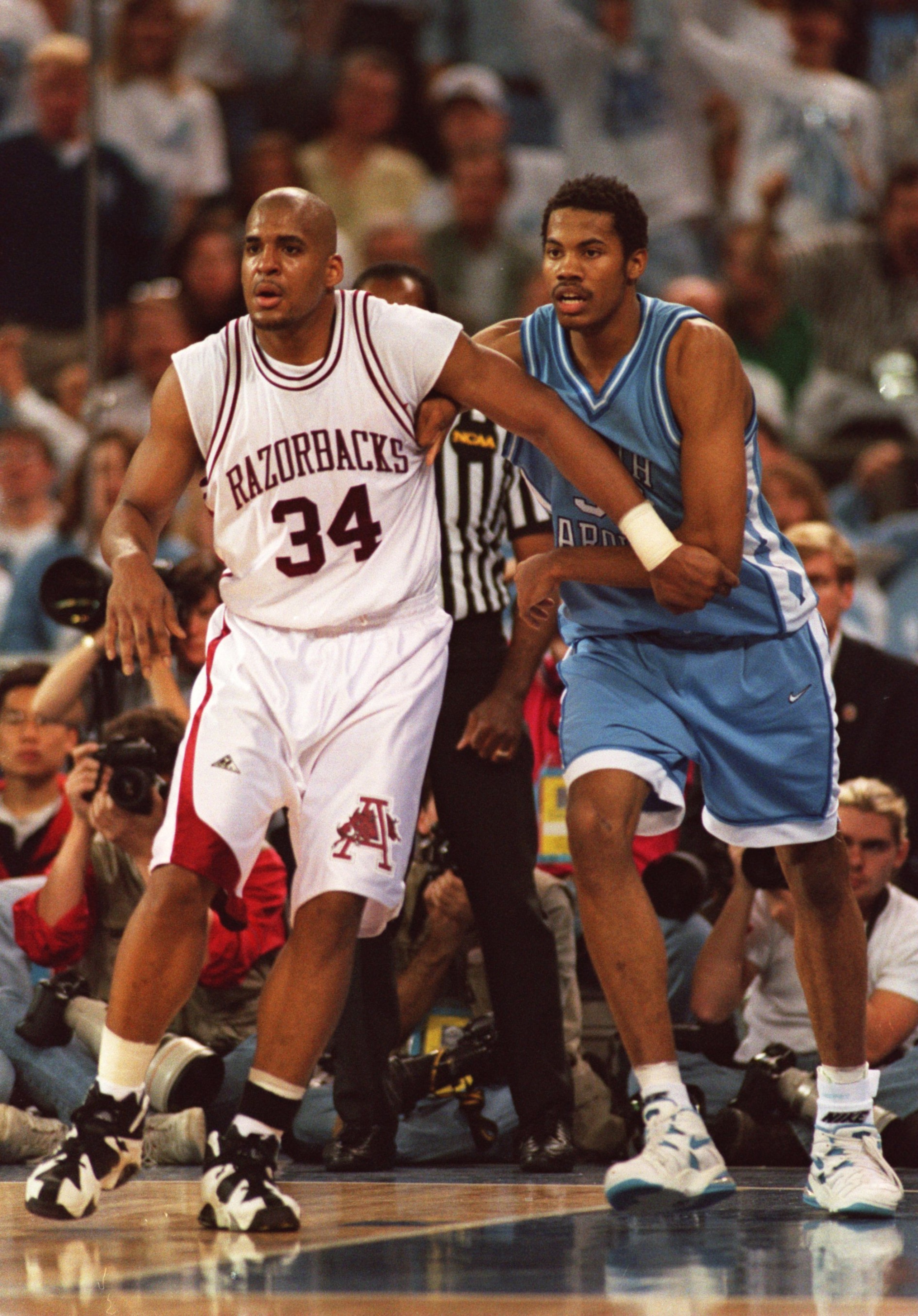 1 APR 1995:  NORTH CAROLINA CENTER RASHEED WALLACE BATTLES WITH ARKANSAS FORWARD CORLISS WILLIAMSON FOR POSITION ON THE POST DURING THE TAR HEELS 75-68 LOSS TO THE RAZORBACKS IN THE NCAA FINAL FOUR AT THE KINGDOME IN SEATTLE, WASHINGTON. Mandatory Credit: