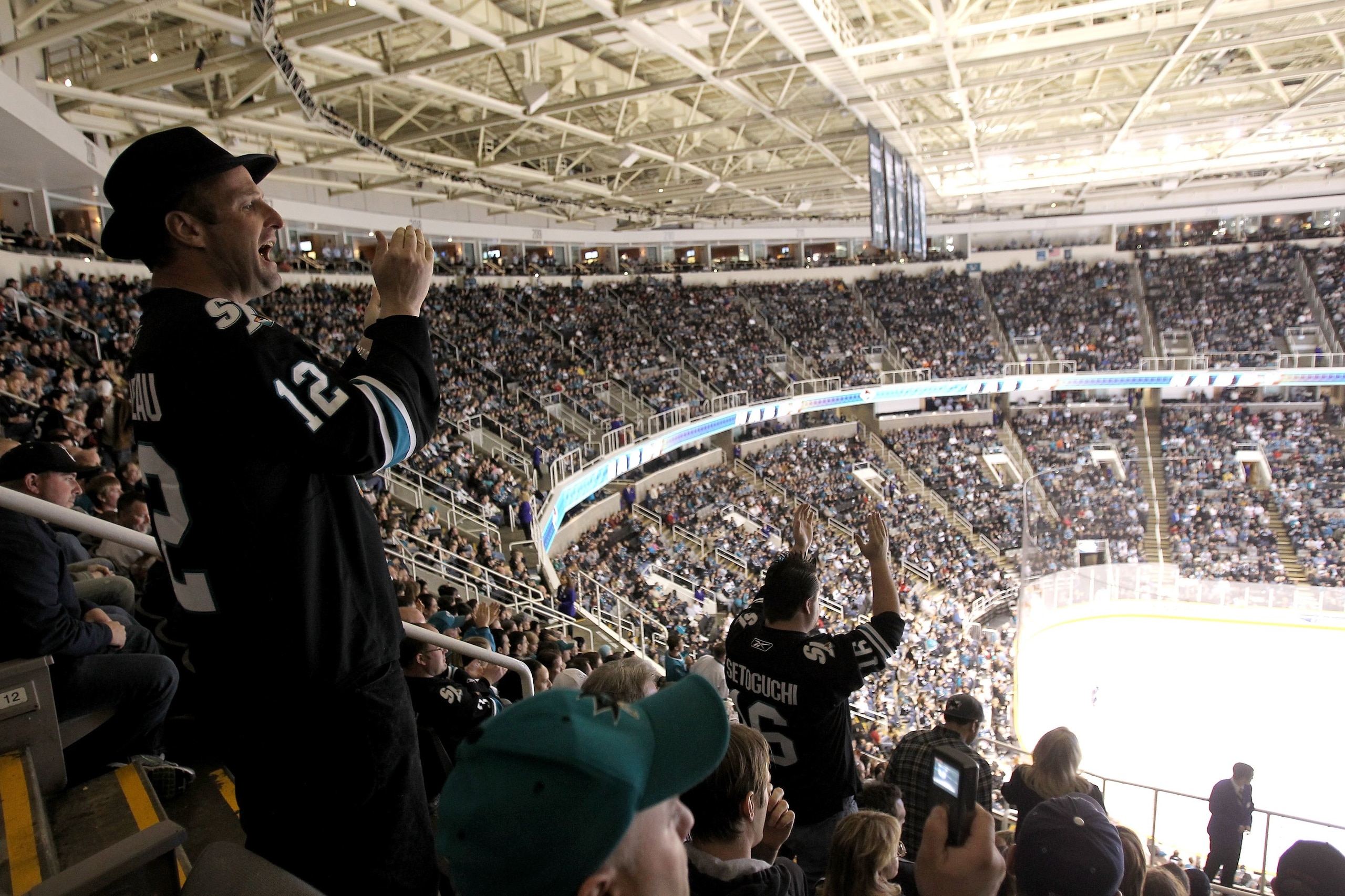 SAN JOSE, CA - APRIL 08:  Fans cheer during the San Jose Sharks against the Vancouver Canucks at HP Pavilion on April 8, 2010 in San Jose, California.  (Photo by Ezra Shaw/Getty Images)
