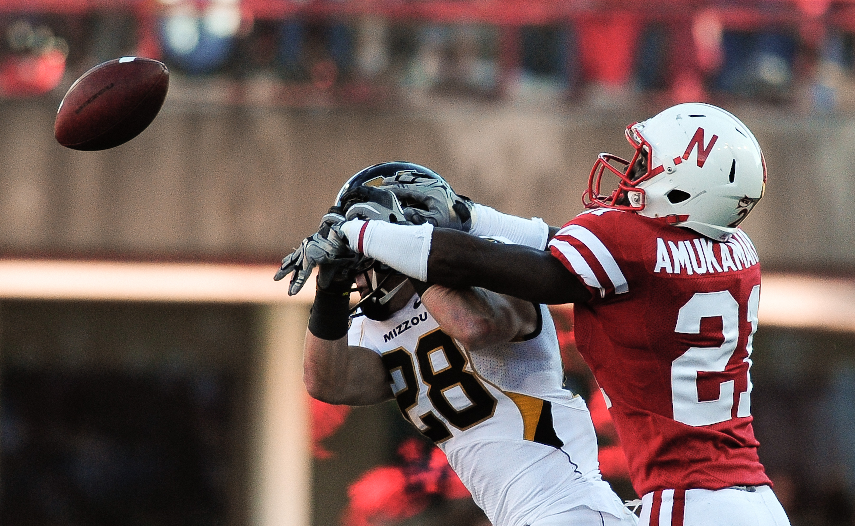 LINCOLN, NE - OCTOBER 30: Cornerback Prince Amukamara #21 of the Nebraska Cornhuskers breaks up a pass intended for wide receiver T.J. Moe #28 of the Missouri Tigers during first half action of their game at Memorial Stadium on October 30, 2010 in Lincoln