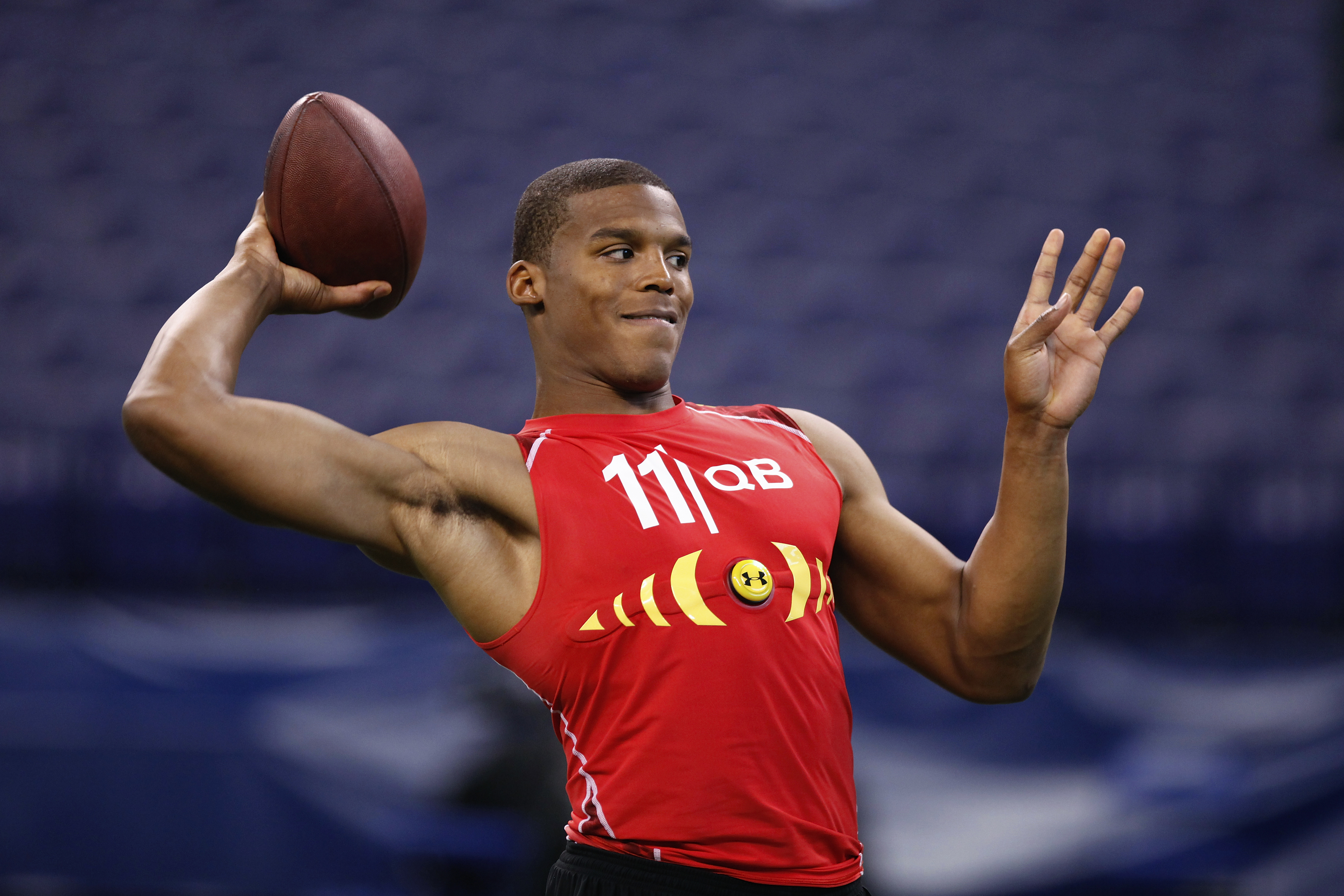 INDIANAPOLIS, IN - FEBRUARY 27: Cam Newton passes the ball during the 2011 NFL Scouting Combine at Lucas Oil Stadium on February 27, 2011 in Indianapolis, Indiana. (Photo by Joe Robbins/Getty Images)