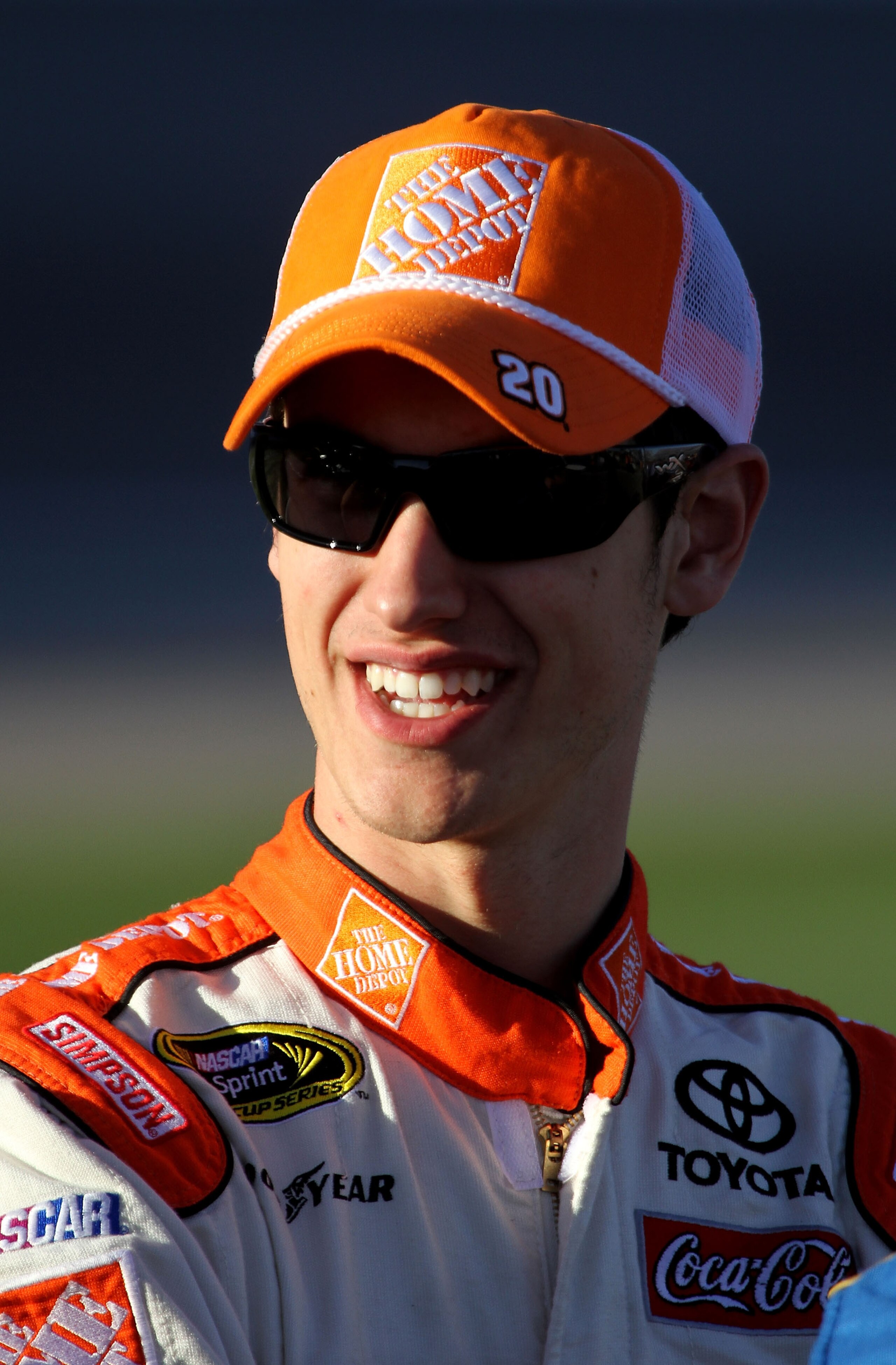 LAS VEGAS, NV - MARCH 04:  Joey Logano, driver of the #20 The Home Depot Toyota, walks on the grid during qualifying for the NASCAR Sprint Cup Series Kobalt Tools 400 at Las Vegas Motor Speedway on March 4, 2011 in Las Vegas, Nevada.  (Photo by Jerry Mark