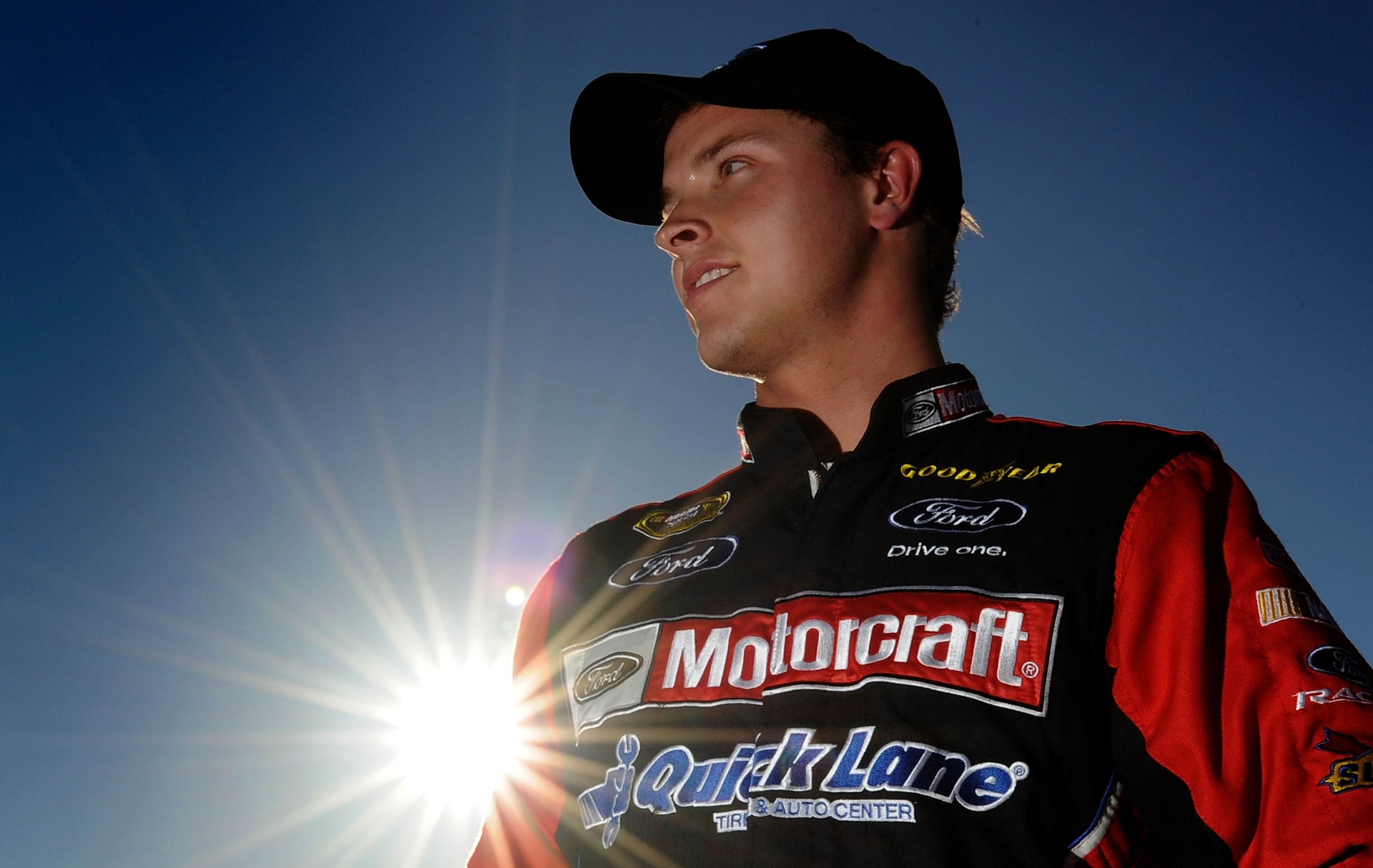 LAS VEGAS, NV - MARCH 04:  Trevor Bayne, driver of the #21 Motorcraft/Quick Lane Tire & Auto Center Ford, stands next to his car after qualifying for the NASCAR Sprint Cup Series Kobalt Tools 400 at Las Vegas Motor Speedway on March 4, 2011 in Las Vegas,