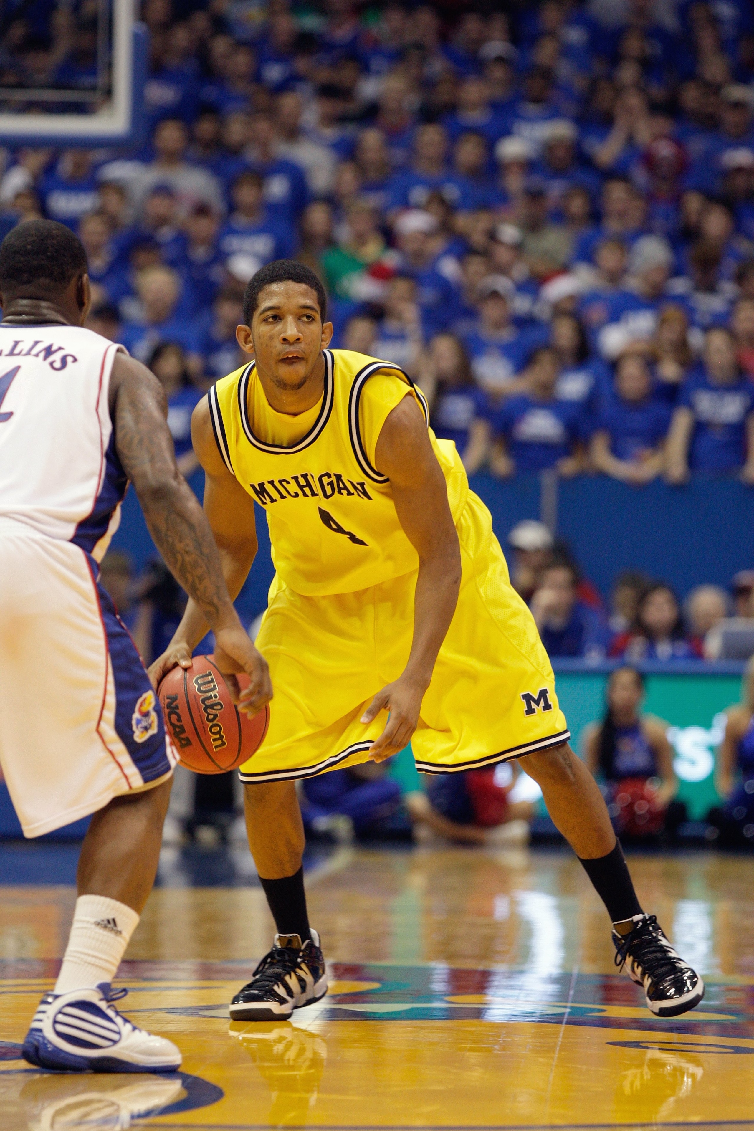 LAWRENCE, KS - DECEMBER 19: Darius Morris #4 of the Mighigan Wolverines dribbles the ball during the game against the Kansas Jayhawks on December 19, 2009 at Allen Fieldhouse in Lawrence, Kansas. (Photo by Jamie Squire/Getty Images)