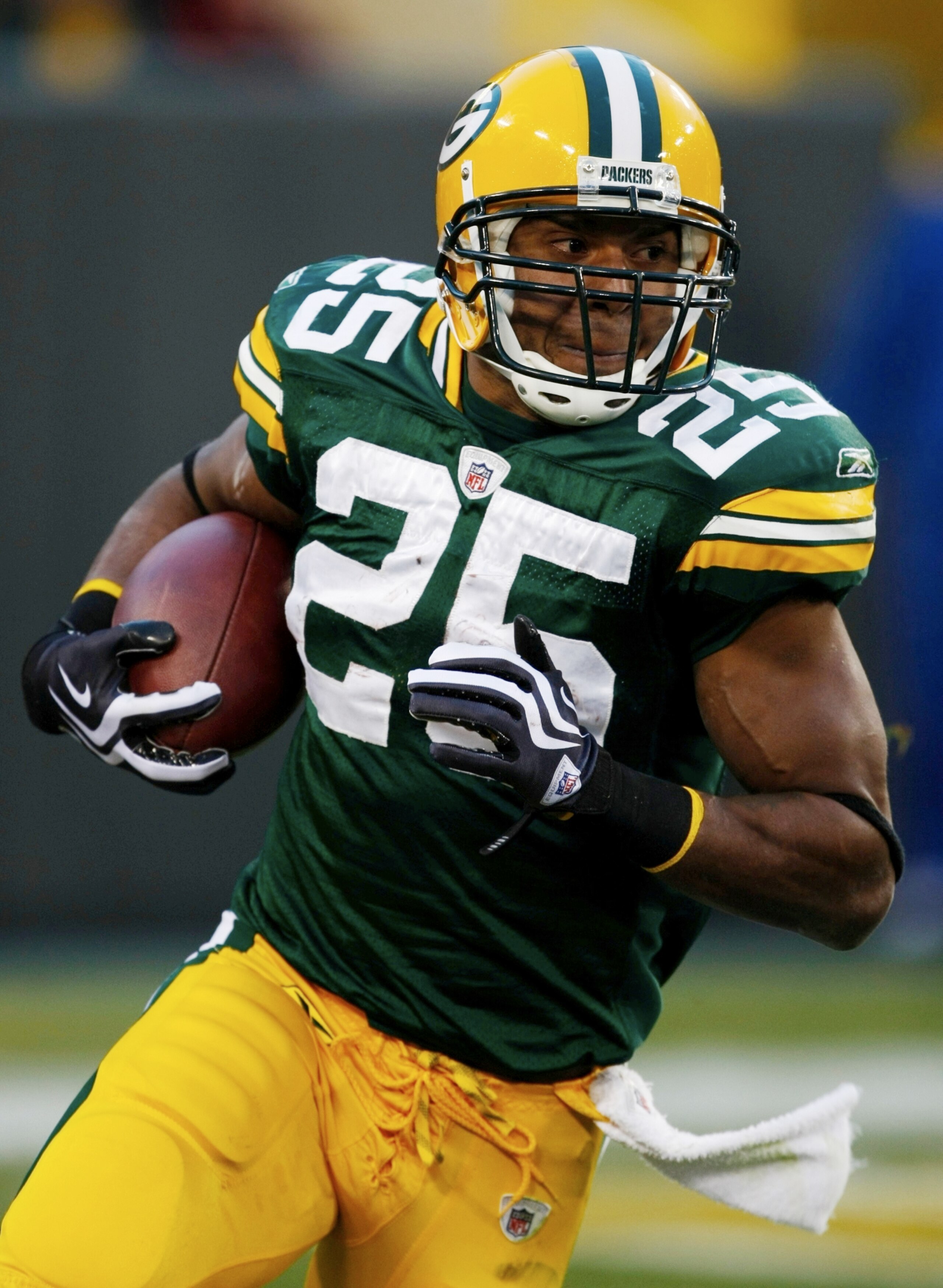 GREEN BAY, WI - NOVEMBER 01:  Running back Ryan Grant #25 of the Green Bay Packers carries the ball against the Minnesota Vikings during the second quarter of the game at Lambeau Field on November 1, 2009 in Green Bay, Wisconsin. (Photo by Scott Boehm/Get
