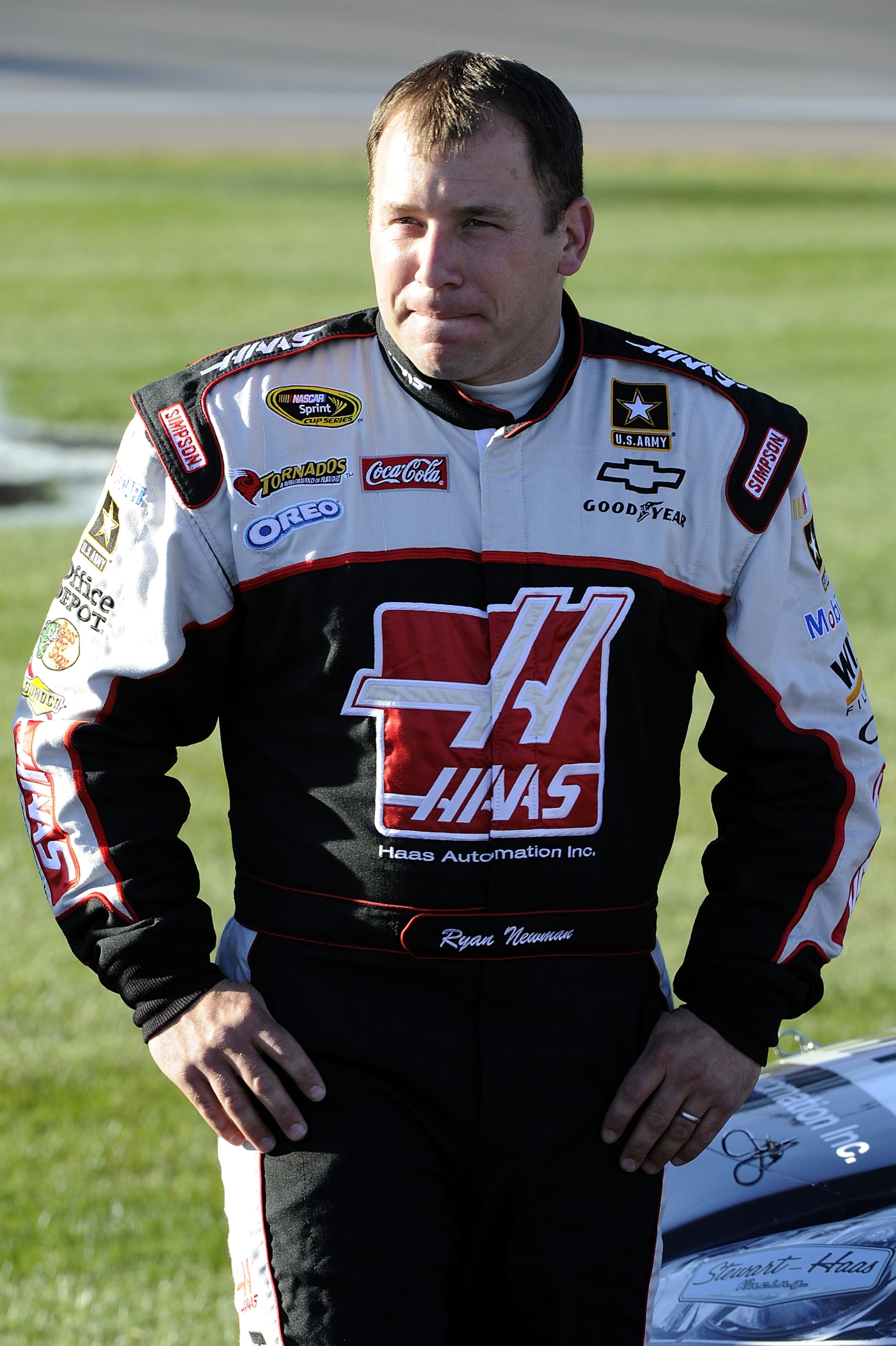 LAS VEGAS, NV - MARCH 04:  Ryan Newman, driver of the #39 Haas Automation Chevrolet, waits by his car during qualifying for the NASCAR Sprint Cup Series Kobalt Tools 400 at Las Vegas Motor Speedway on March 4, 2011 in Las Vegas, Nevada.  (Photo by John Ha